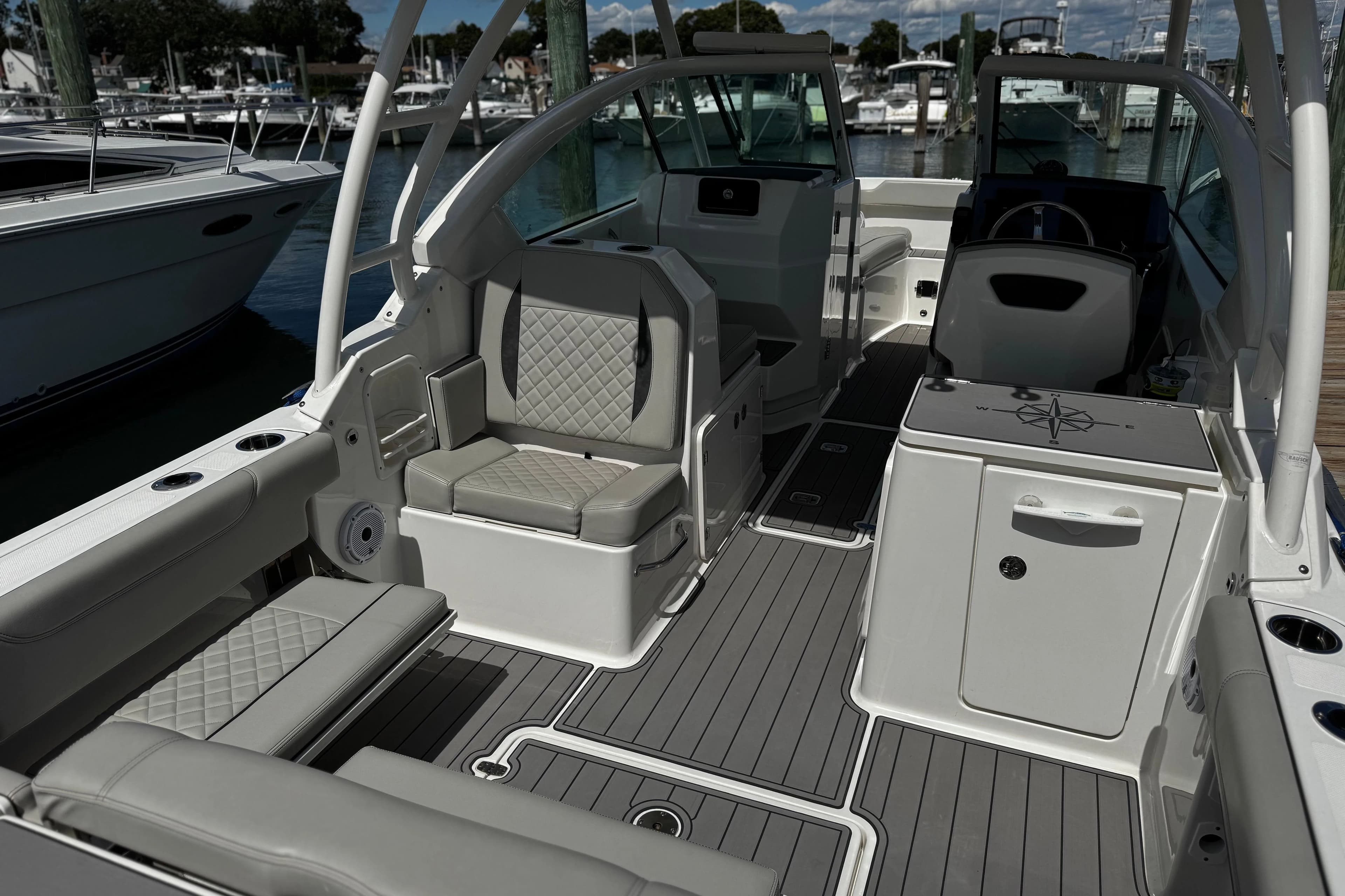 Interior of 2023 Pursuit DC 266 Dual Console with luxurious seating.