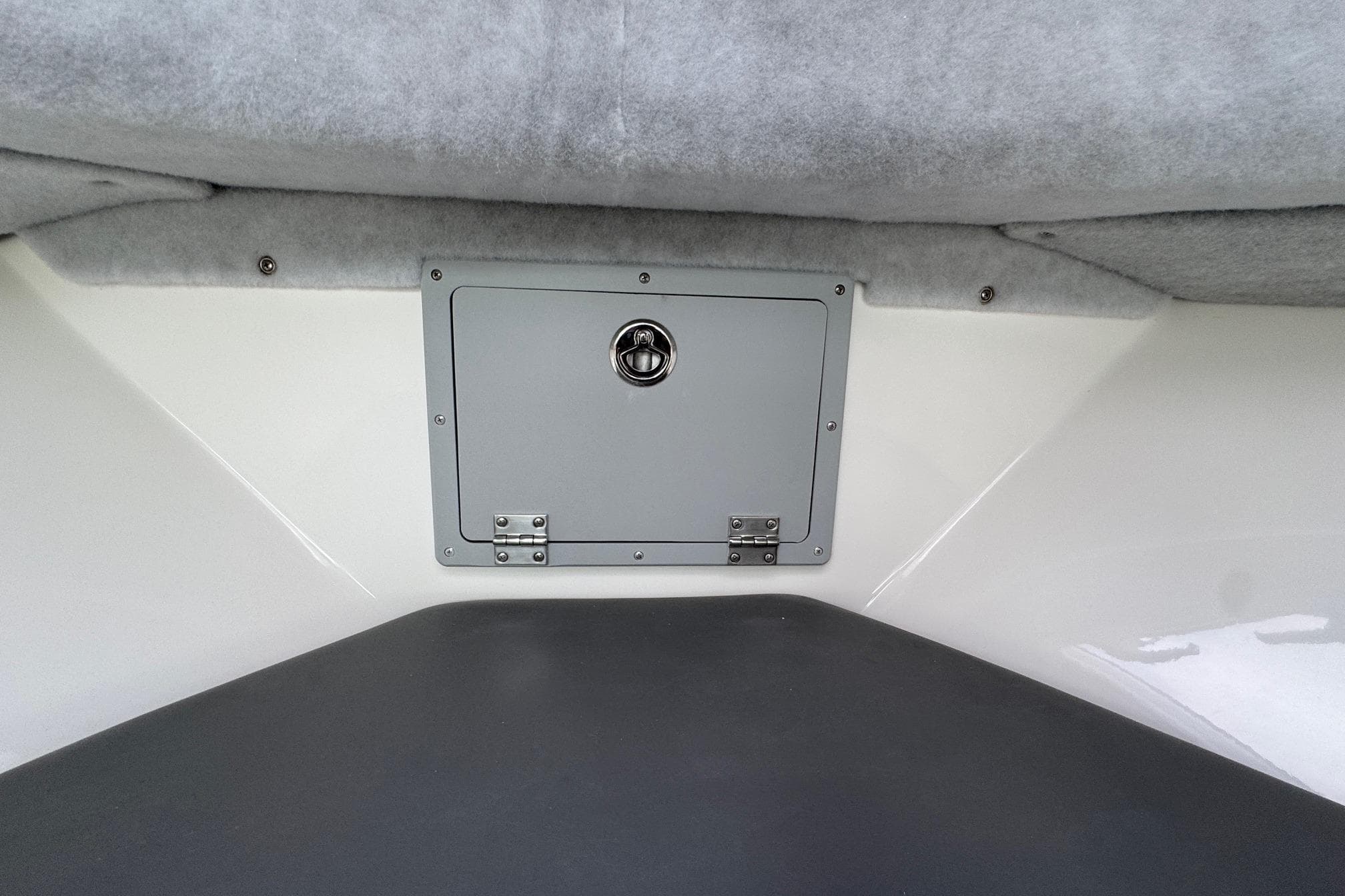 Interior storage compartment of 2026 Defiance Admiral 220 EX boat.