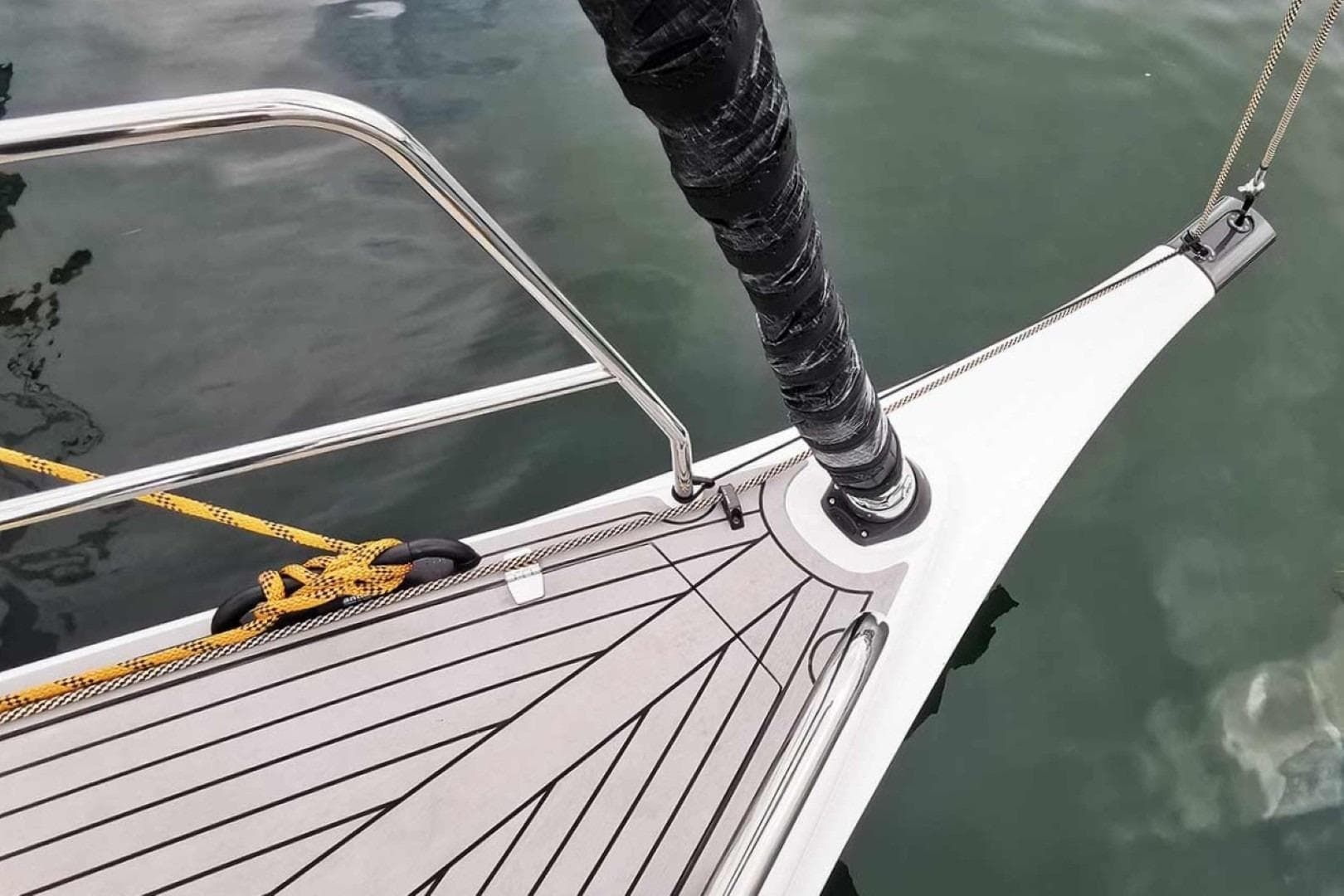 Bow of 2025 Shogun 43 yacht with sleek deck design and mooring rope.