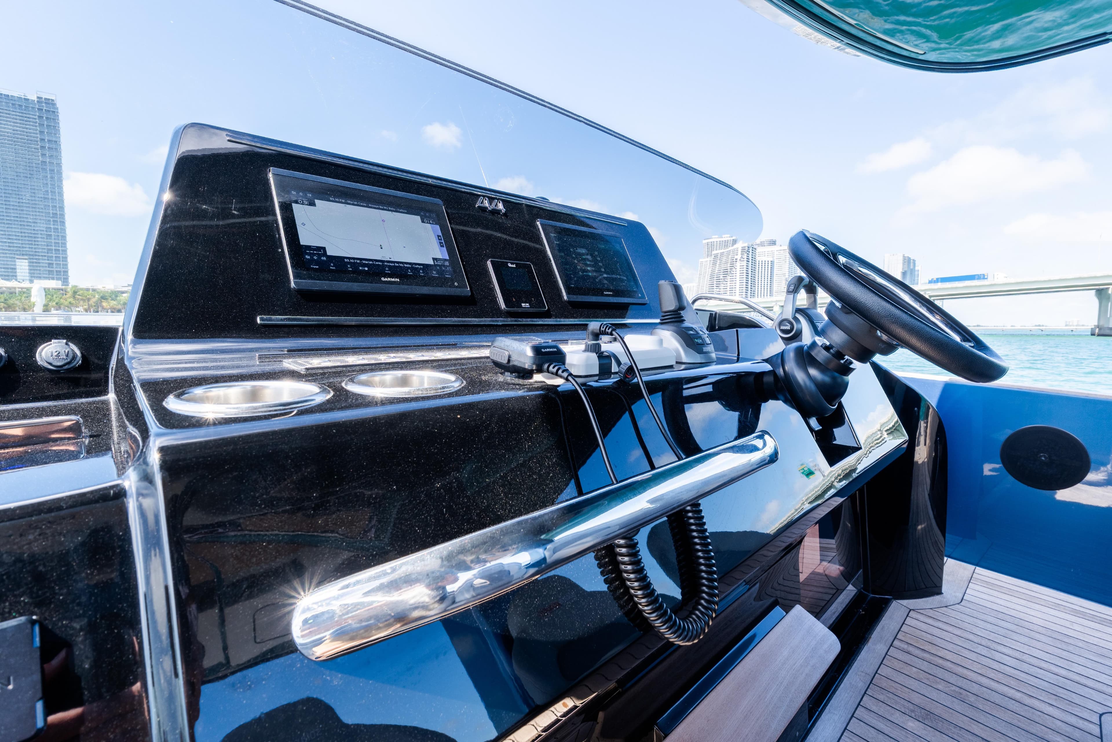 Helm of 2023 Solaris Power 44 Open yacht with modern navigation equipment.