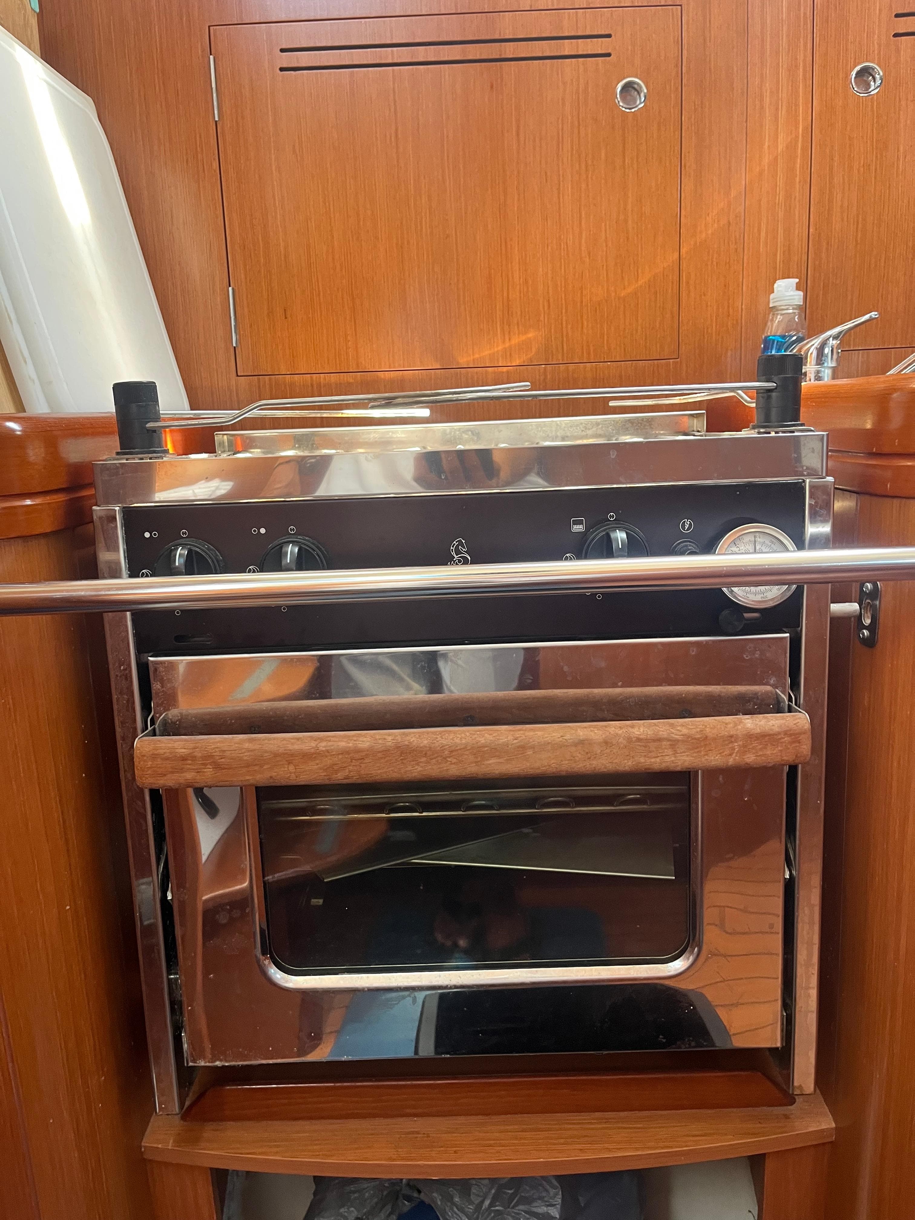 Stainless steel oven in 2007 Beneteau Oceanis Clipper 343 yacht kitchen.
