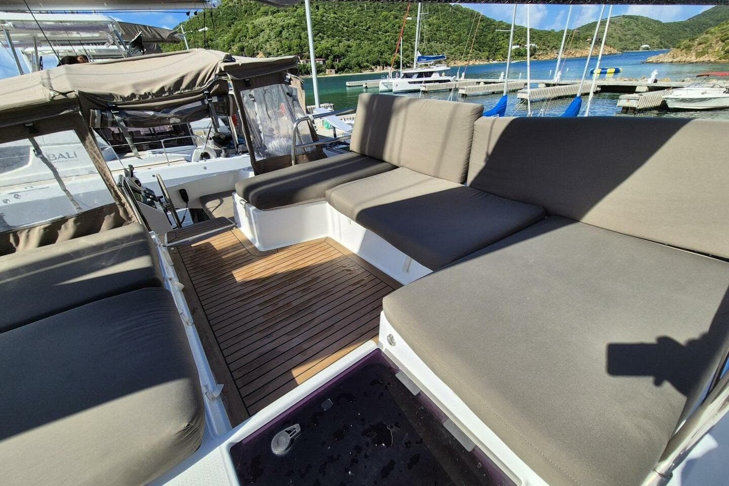 Luxurious 2019 Fountaine Pajot Saona 47 yacht with spacious outdoor seating area.