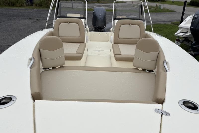 2026 Scout 195 Sport Dorado boat interior with beige seating and modern design.