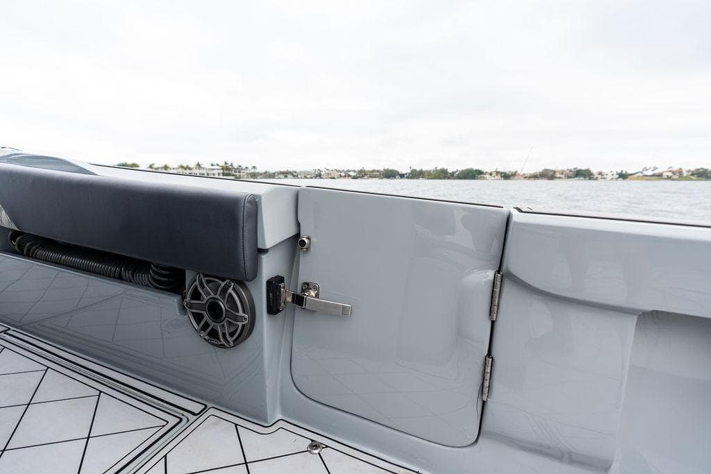 2020 Front Runner 39 CC boat interior with speaker and cushioned seating.