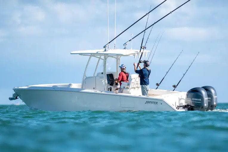 Manufacturer Provided Image: 2026 Jupiter 26 boat with anglers fishing, equipped with dual outboard motors.