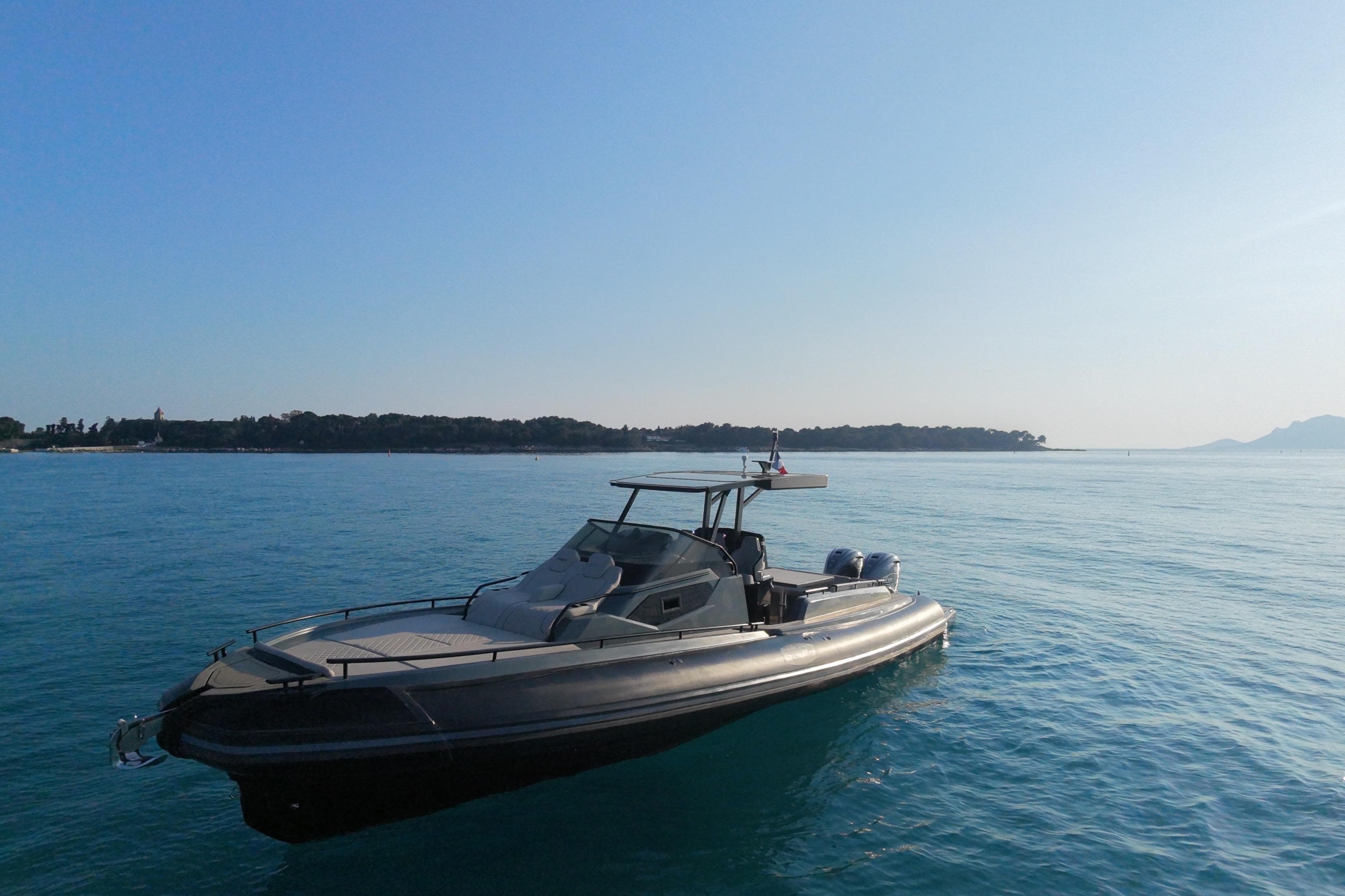 Salpa SOLEIL 42 boat on calm blue sea, 2021 model, with distant shoreline.