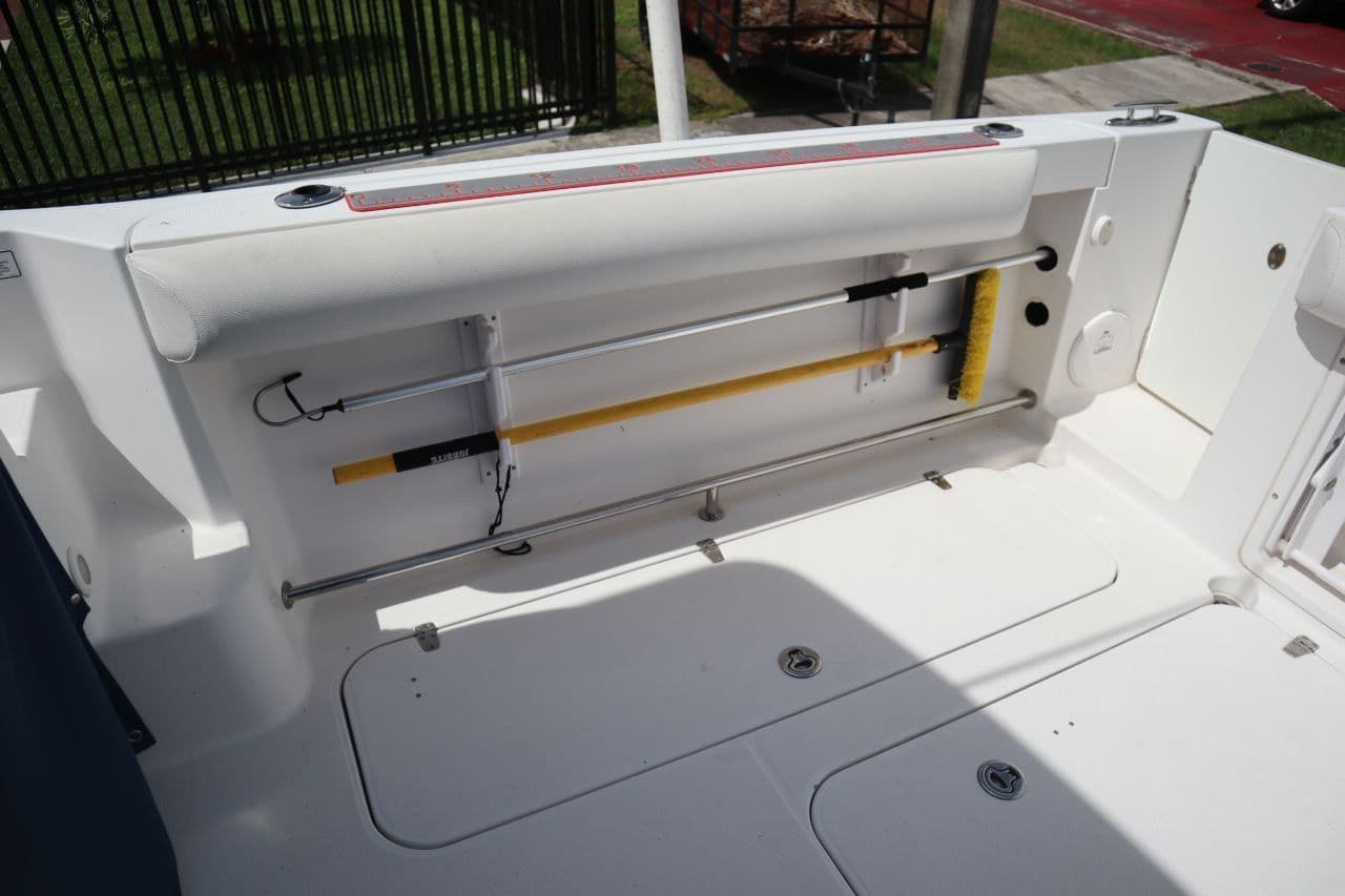 2007 Pro-Line 32 Express boat deck with storage compartments.