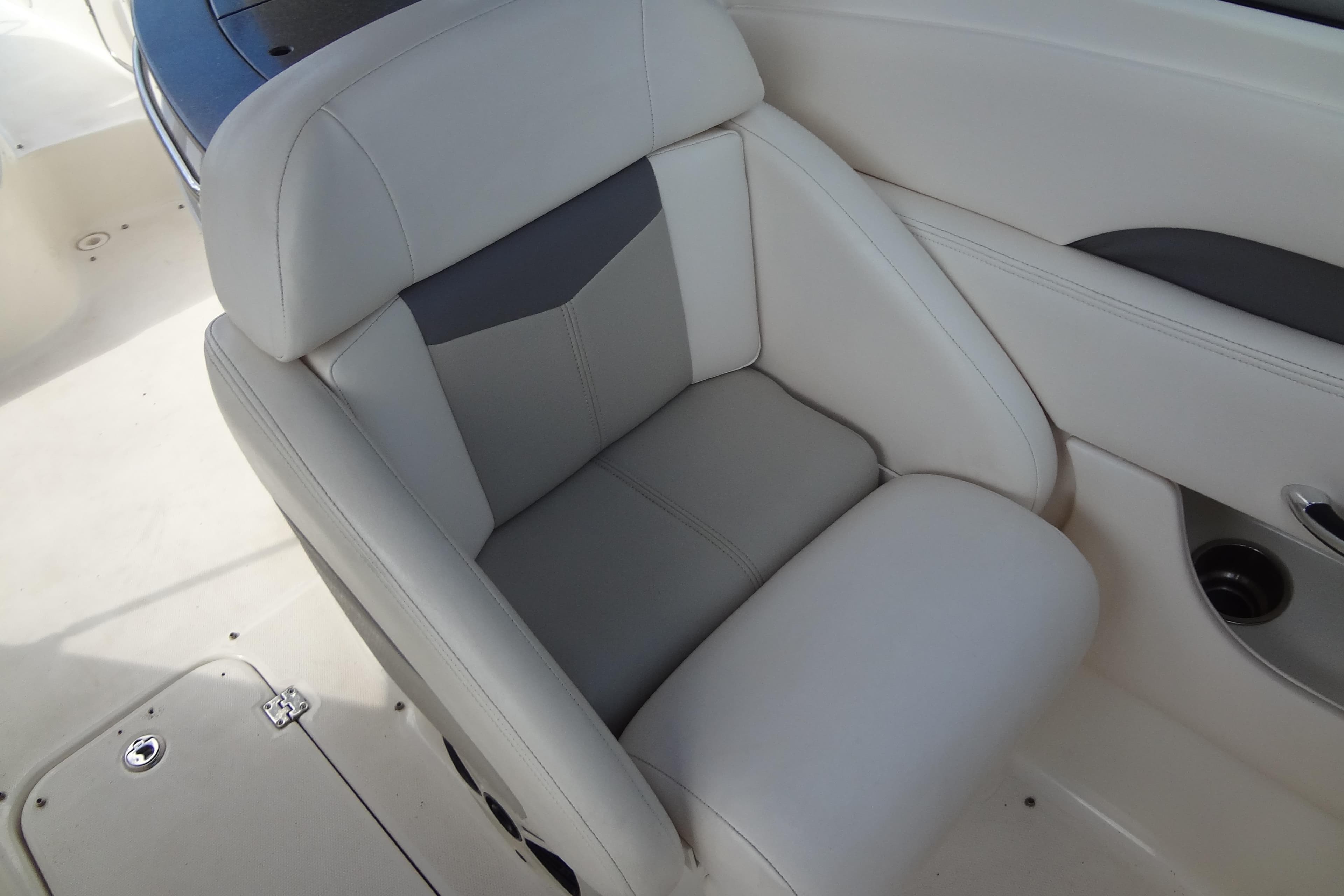 Luxury seating on 2008 Chaparral 276 SSX boat, featuring sleek, comfortable design.