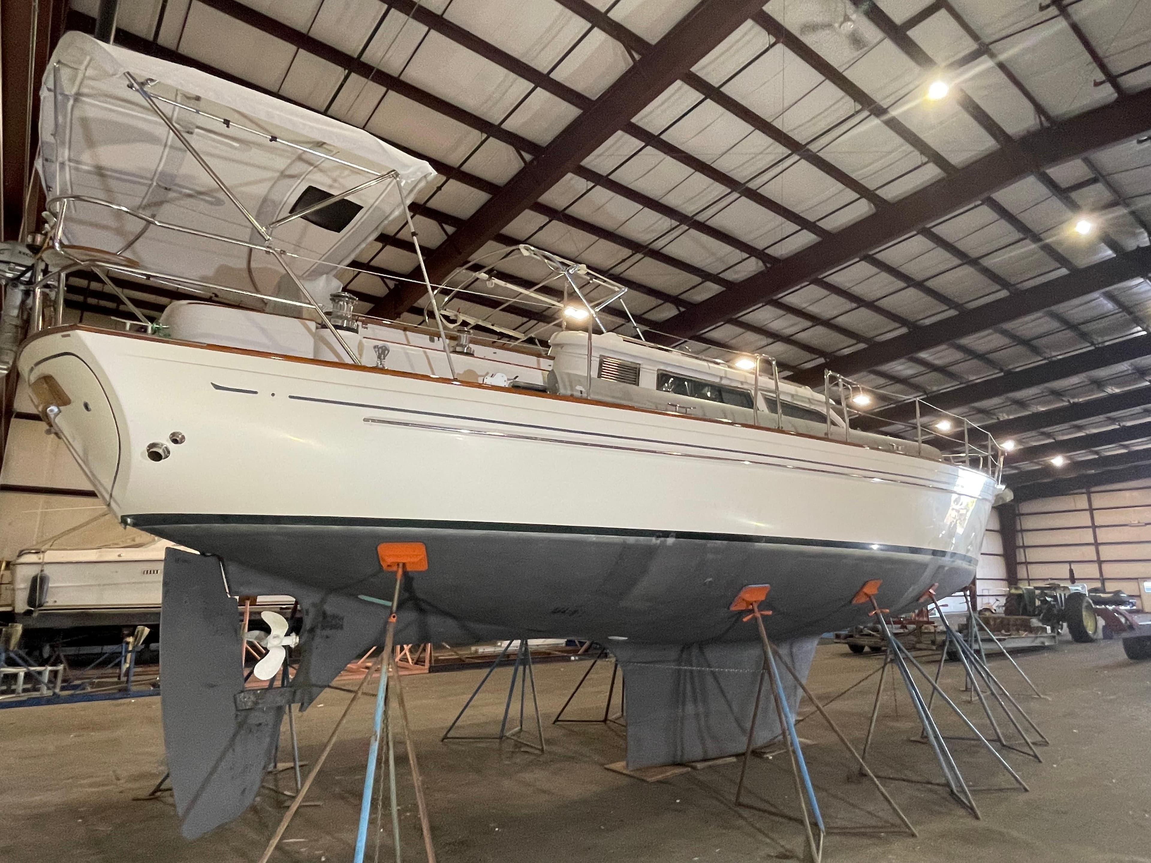2003 Fantasi 44 Pilot House sailboat in indoor storage on stands.