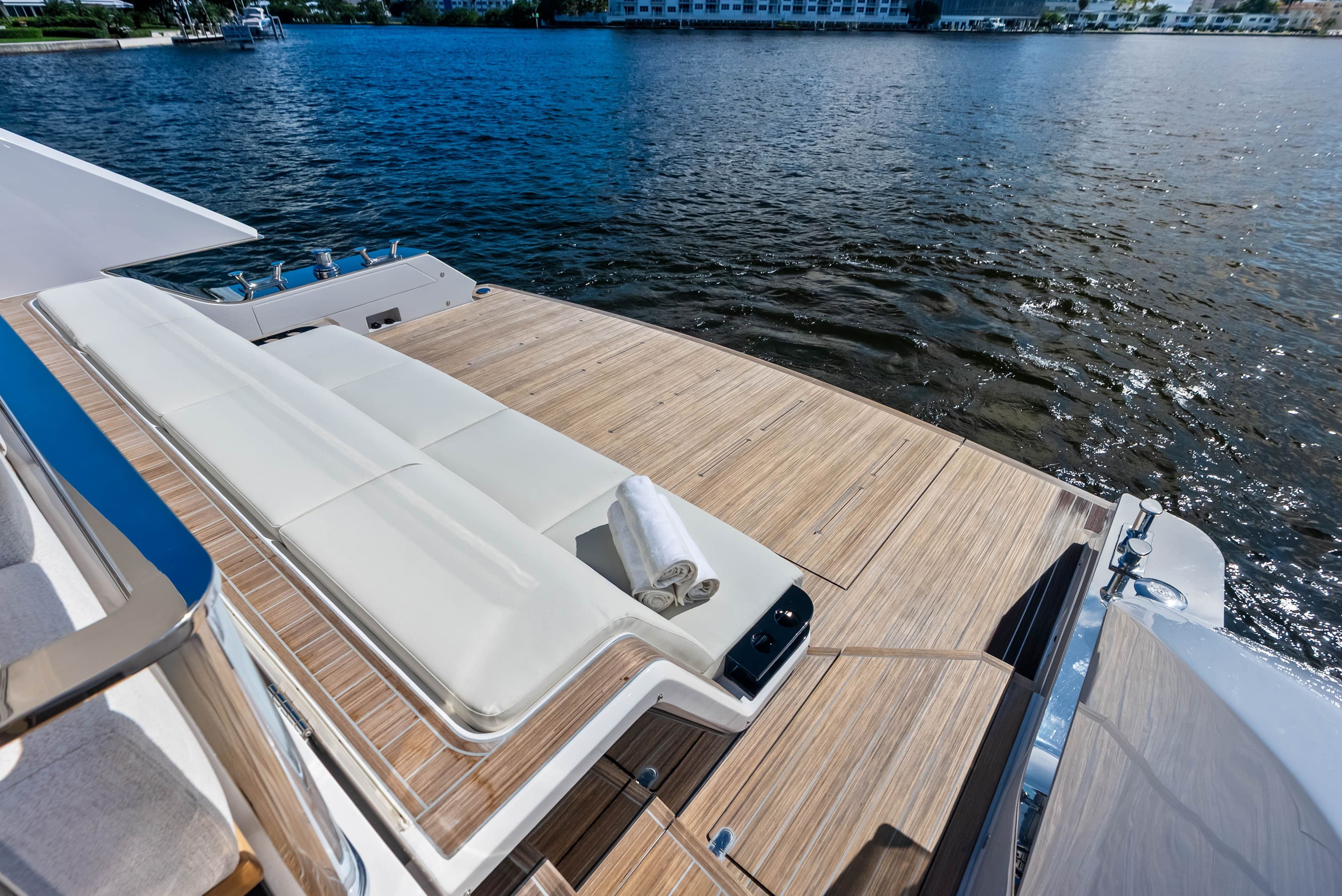 Ferretti Yachts Infynito 80, 2025, luxurious deck overlooking the water.