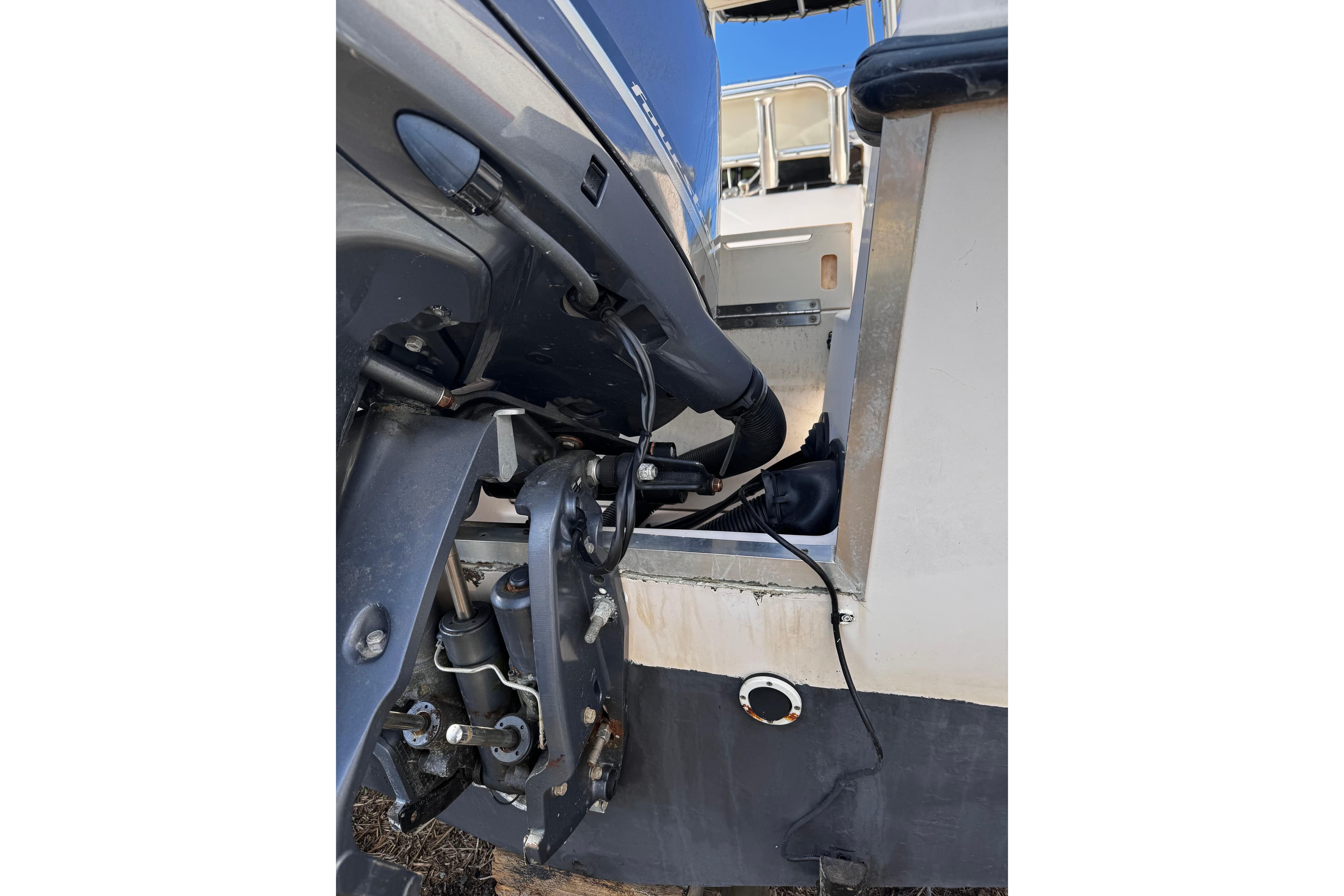 1999 Grady-White Fisherman 222 boat engine detail, showcasing mechanical components.