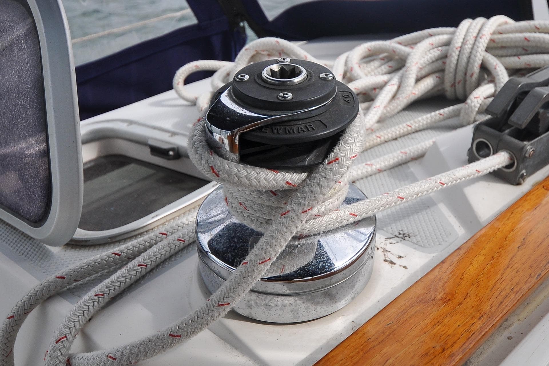 Winch and rope on a 1993 Catalina 42 sailboat deck.