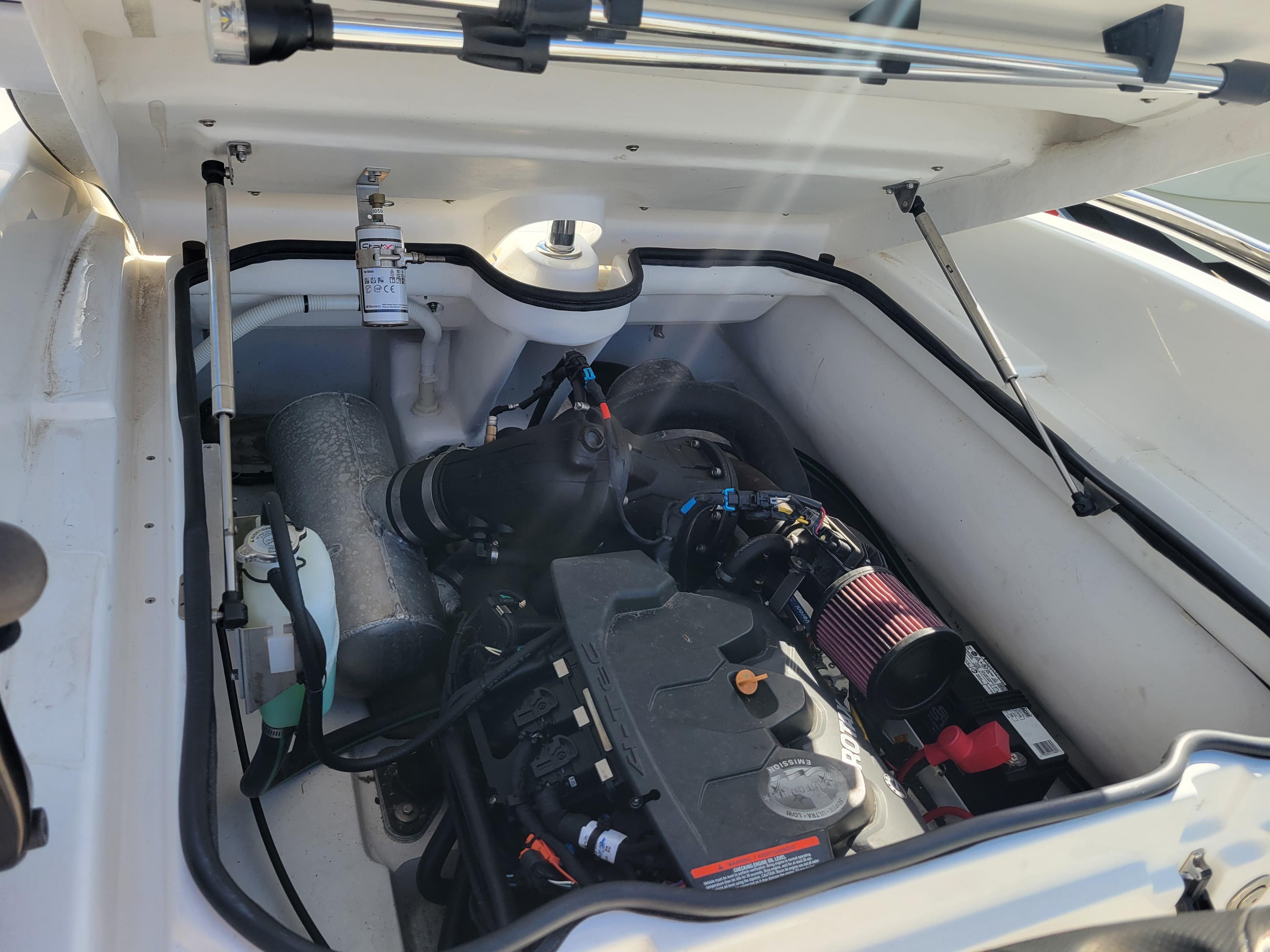 Engine compartment of 2021 AB Inflatables ABJET 430XP, showcasing internal components and layout.