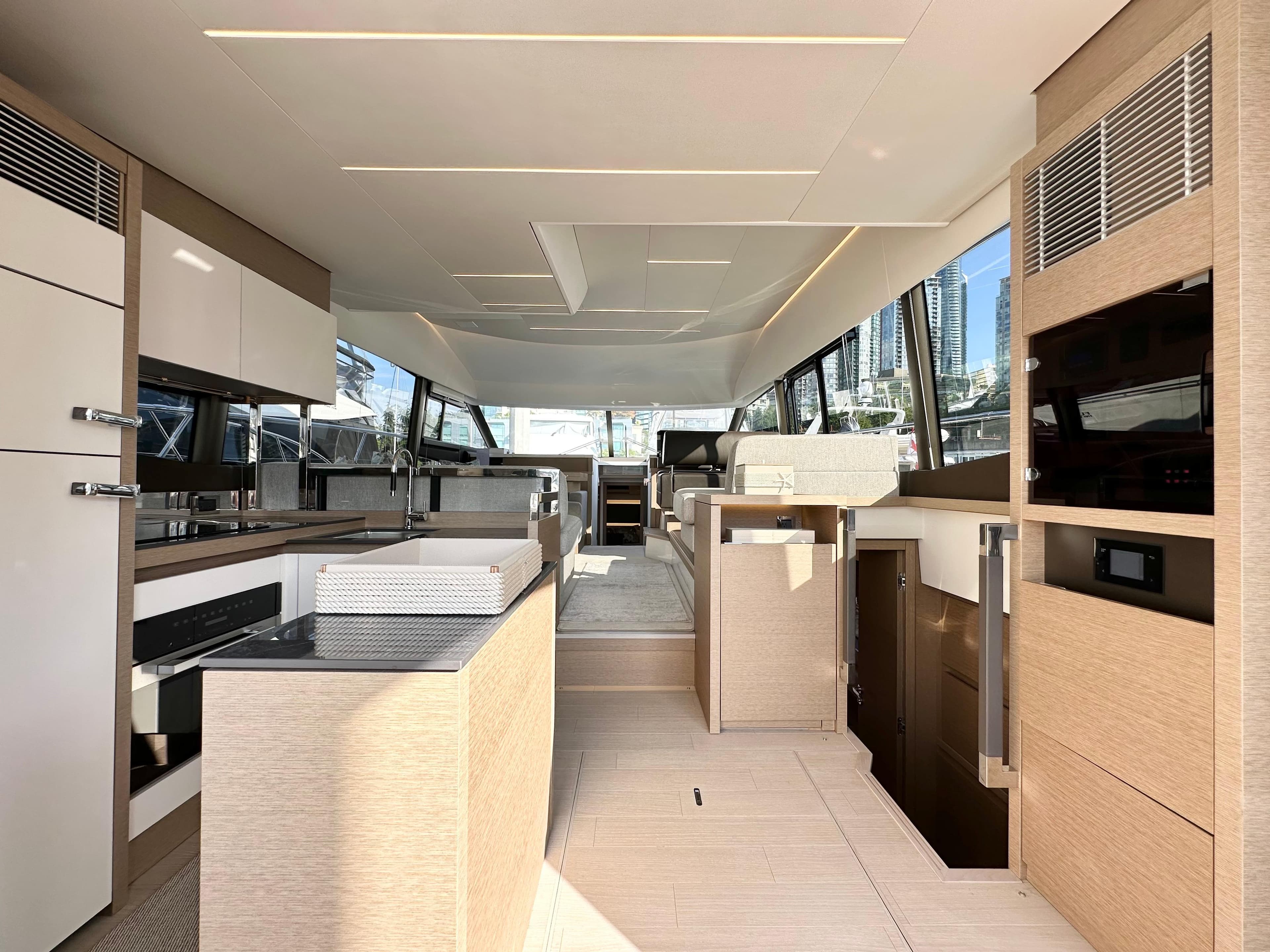 Luxurious interior of 2023 Prestige 520 yacht, featuring modern design and spacious layout.
