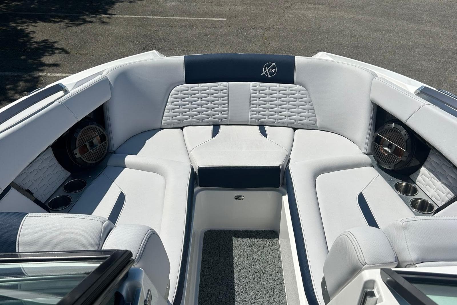 2021 MasterCraft X24 boat interior with luxurious seating and modern design.