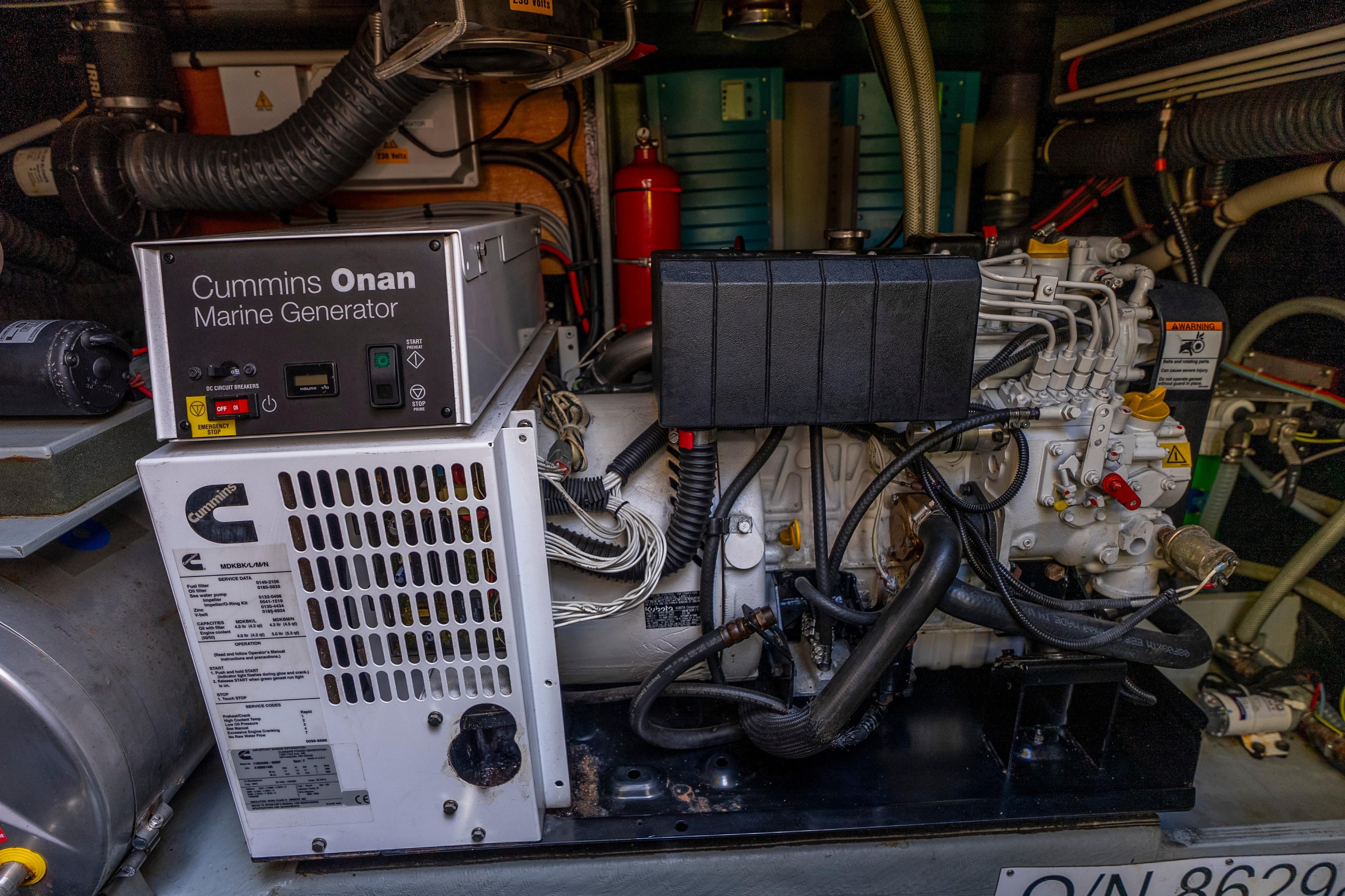 Cummins Onan marine generator in 2010 Amel 54 yacht engine room.