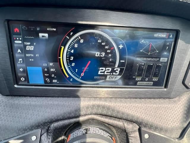Dashboard of a 2022 Centurion Fi23 boat displaying speed, temperature, and depth.