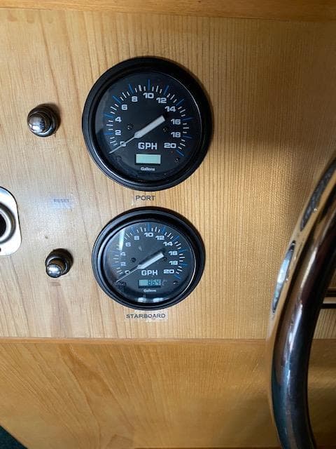 Dashboard gauges on a 1989 Ocean Alexander 42 boat, showing fuel consumption in GPH.