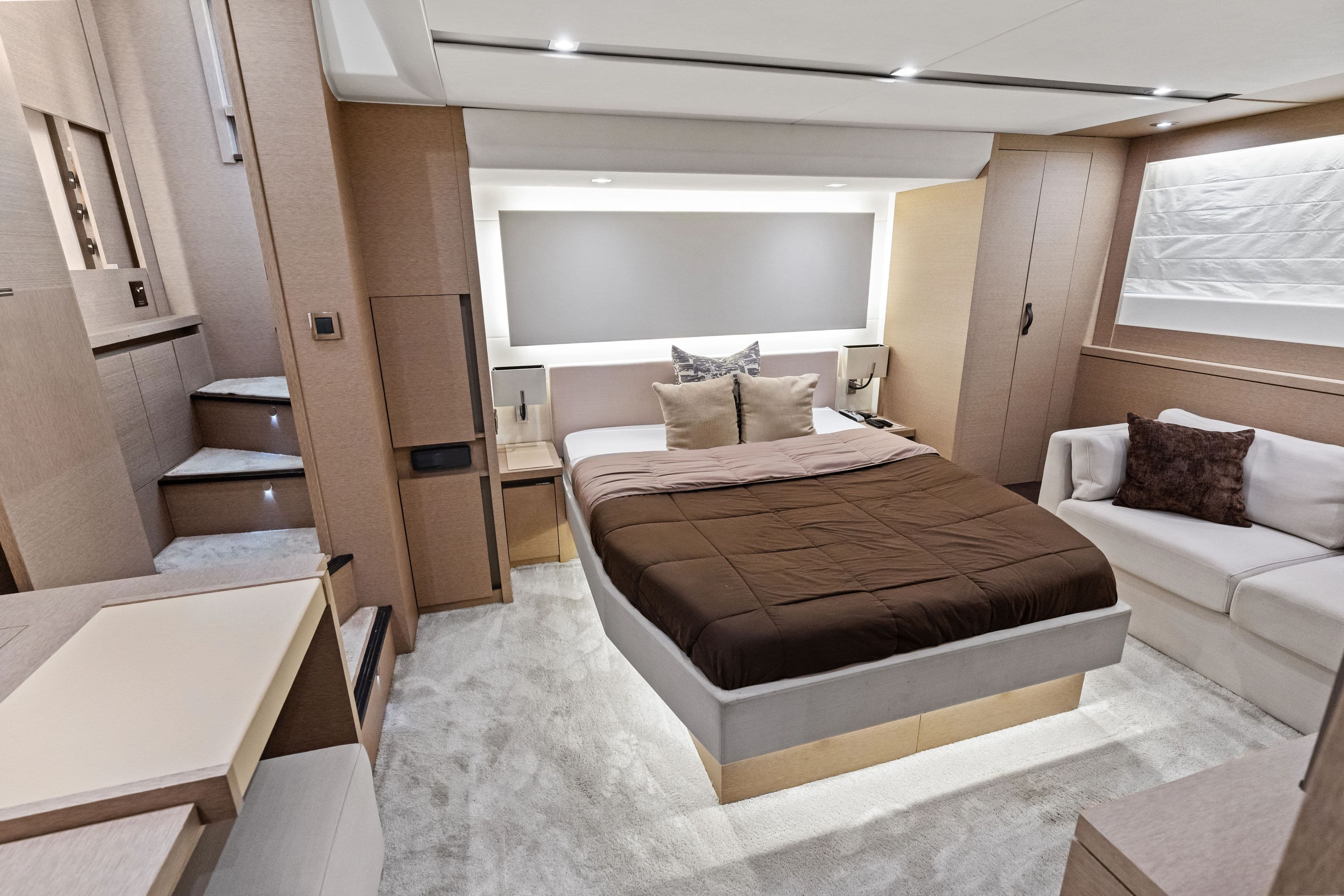 Luxurious bedroom in Prestige 630 yacht, model year 2018.
