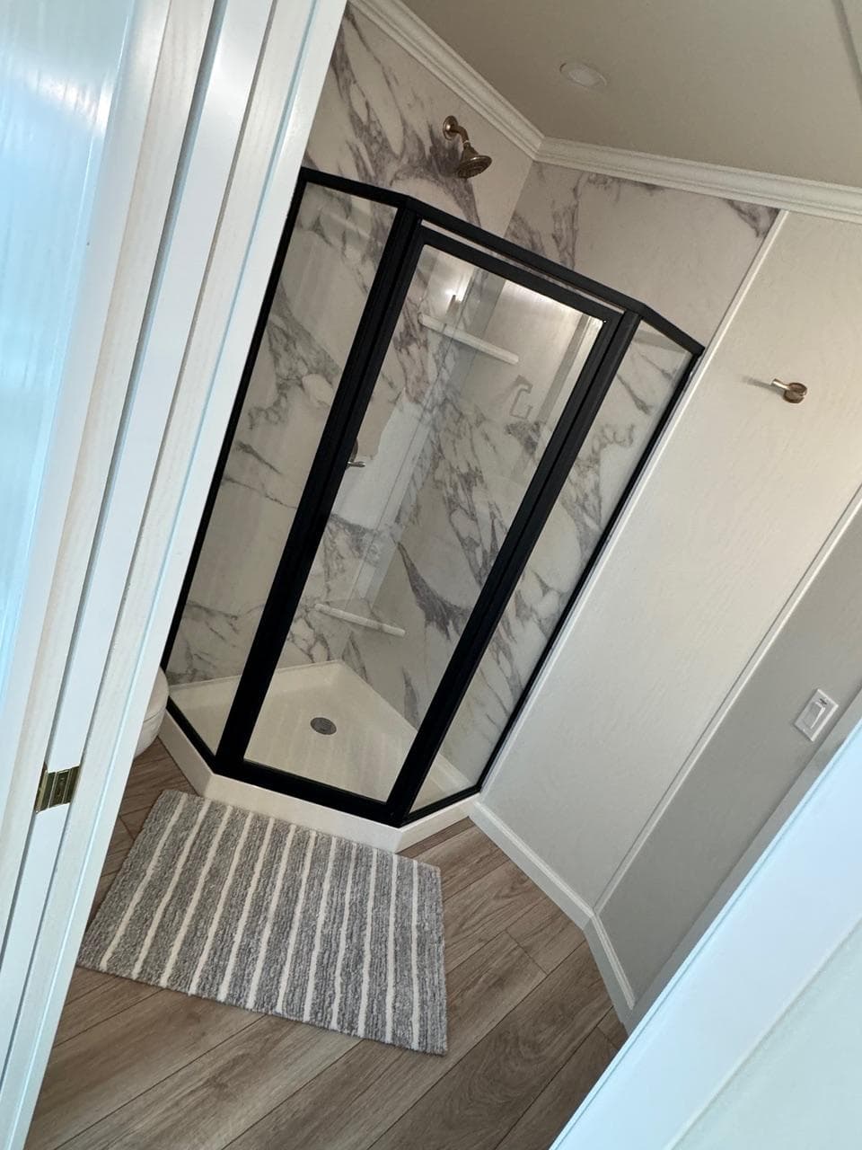 Modern bathroom in 2024 Sumerset Limitless Share 10 with glass shower enclosure.