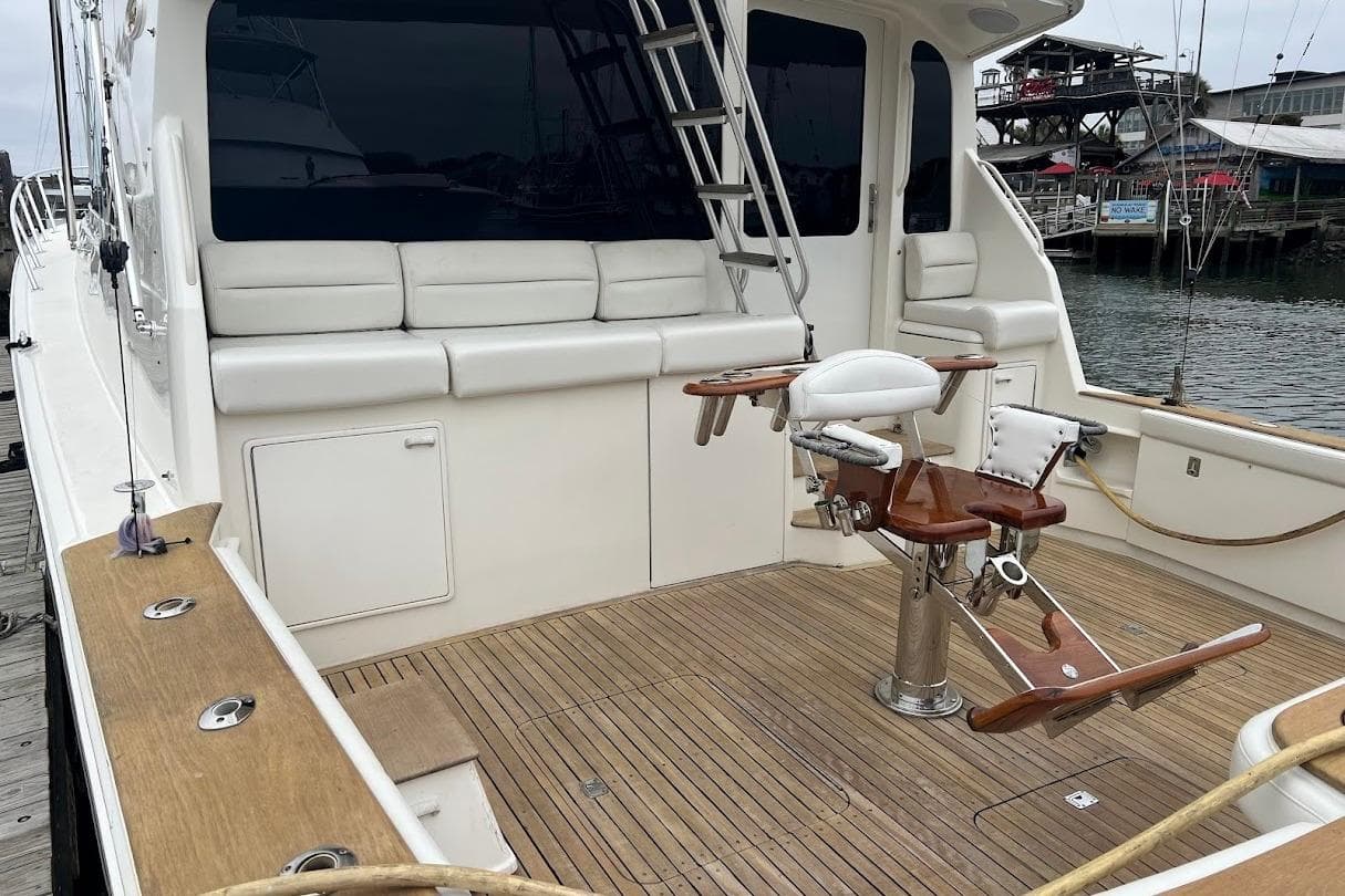2002 Ocean Yachts 56 Super Sport fishing deck with seating and rod holders.