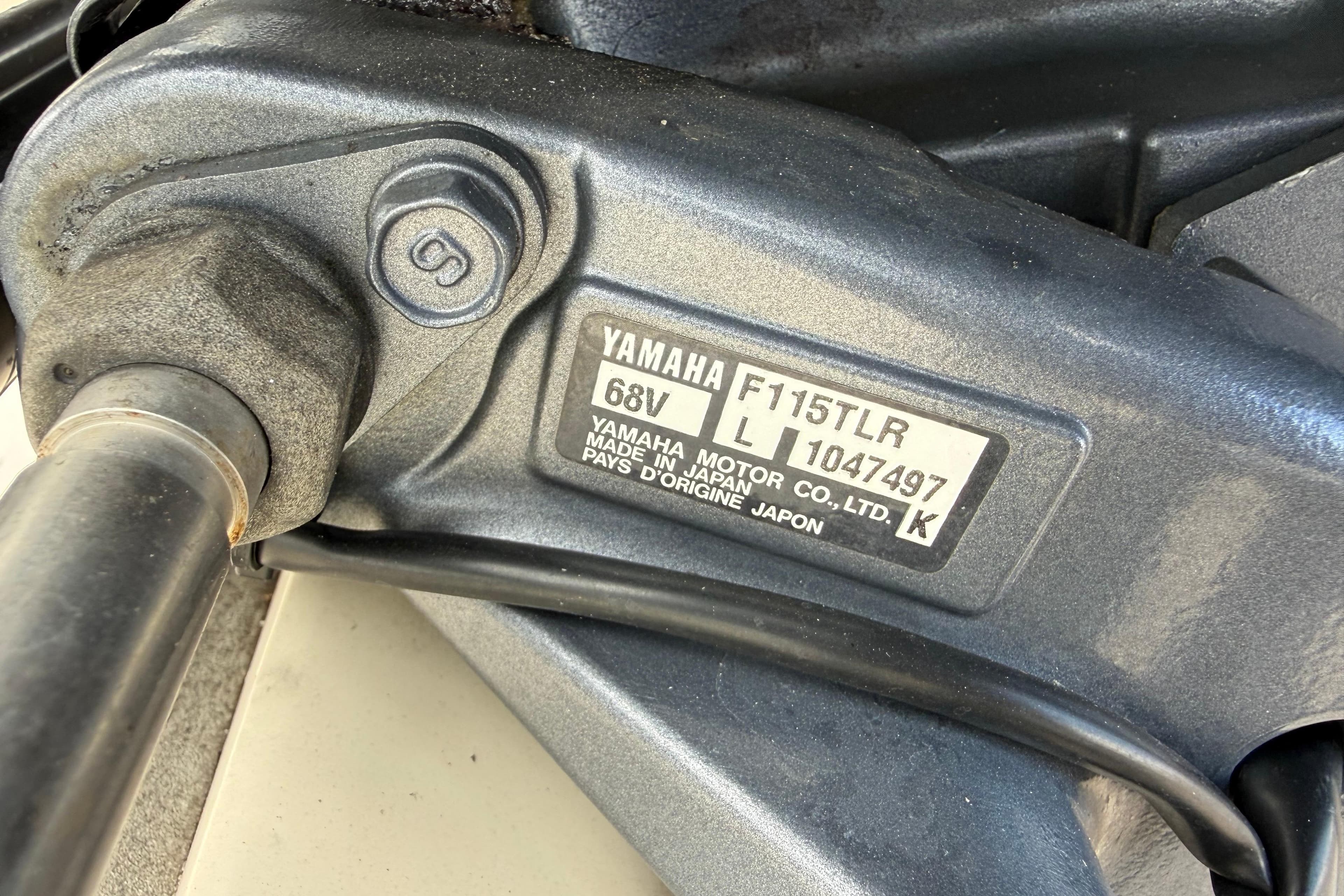Close-up of Yamaha F115TLR engine label on 2006 Scout 170 Costa boat.