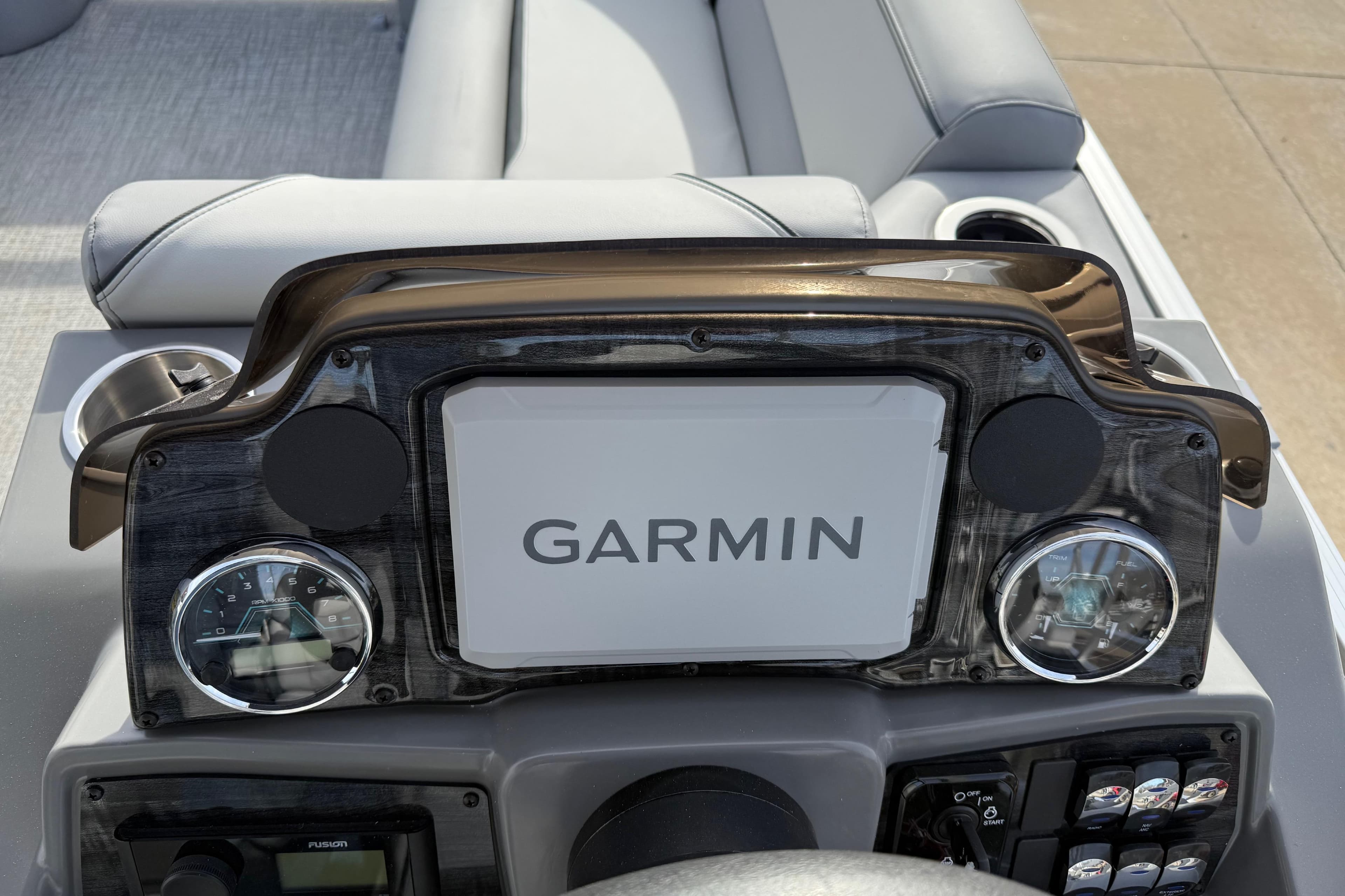 Dashboard of 2026 Avalon Venture 85 Versatile with Garmin display and controls.