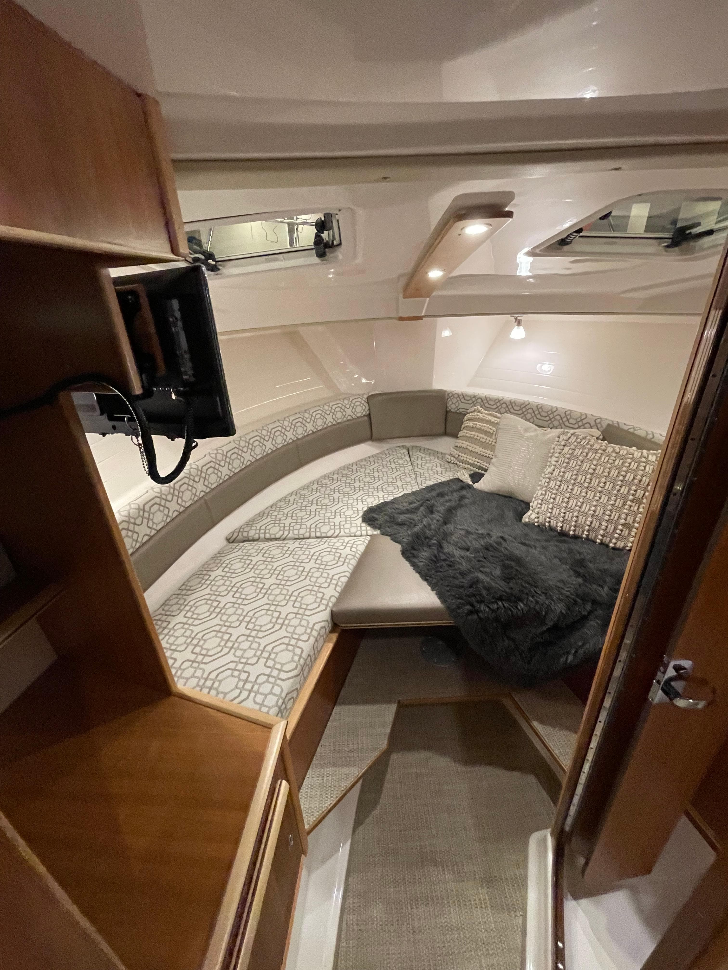 2026 Cutwater C-288 Coupe interior cabin with cozy seating and modern design.