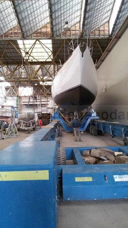 1976 Sangermani Ketch in a shipyard, elevated for maintenance.