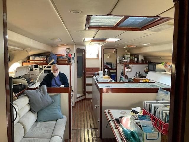 Interior of a 1994 Sundeer 56 yacht with a cozy living area.
