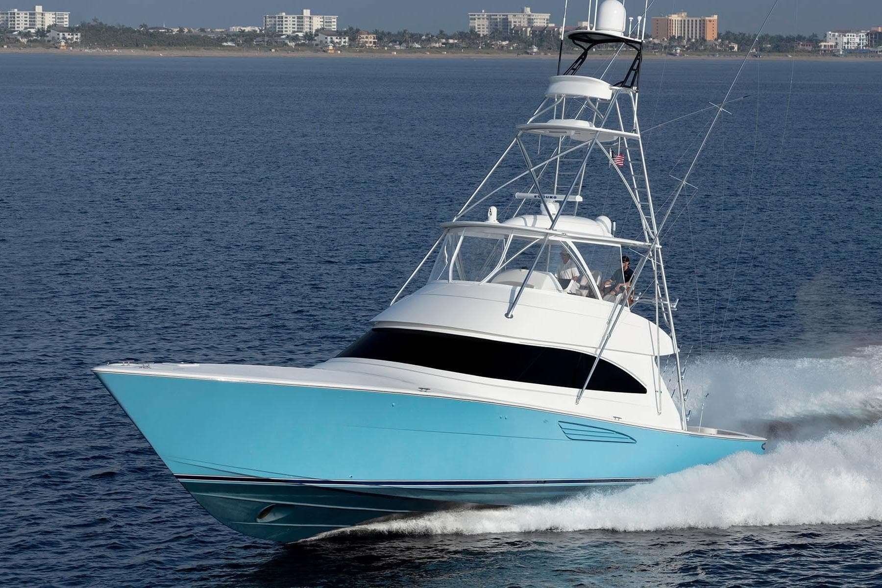 2026 Viking 58 Convertible yacht cruising on open water.