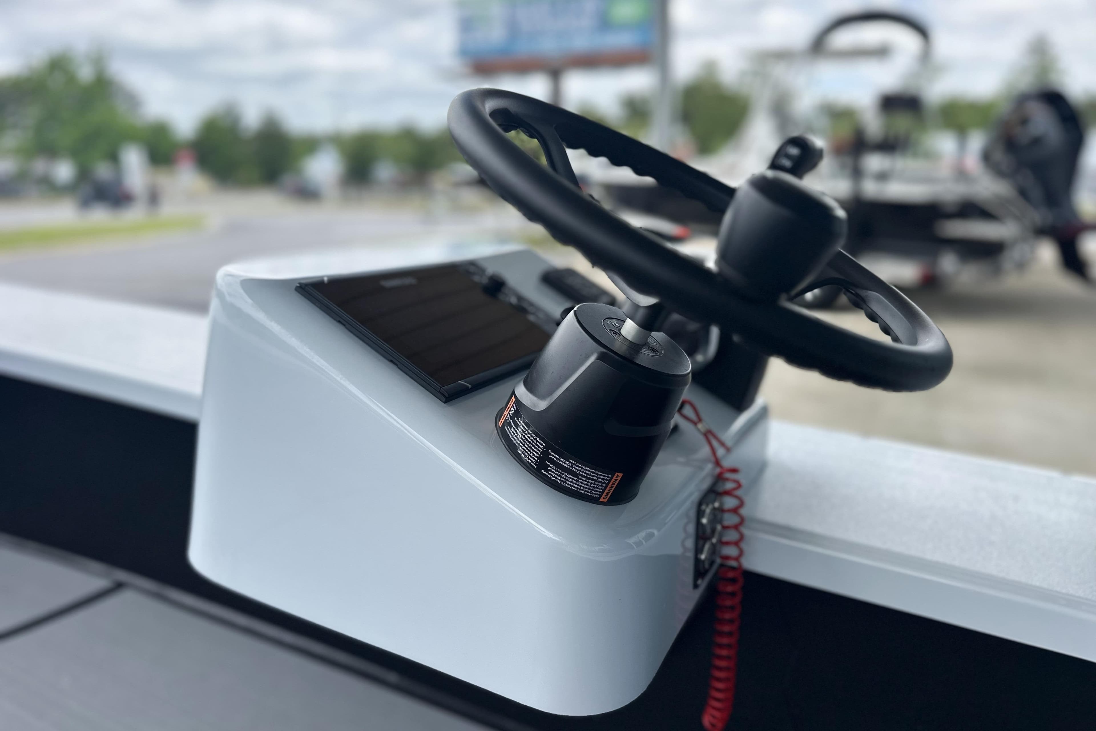 Steering console of 2026 Chittum Skiffs 18 Challenger 2.0 boat, featuring modern design.