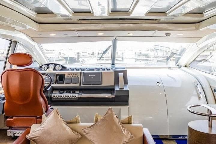 Interior of 2014 Azimut 68S yacht with luxurious helm and seating area.
