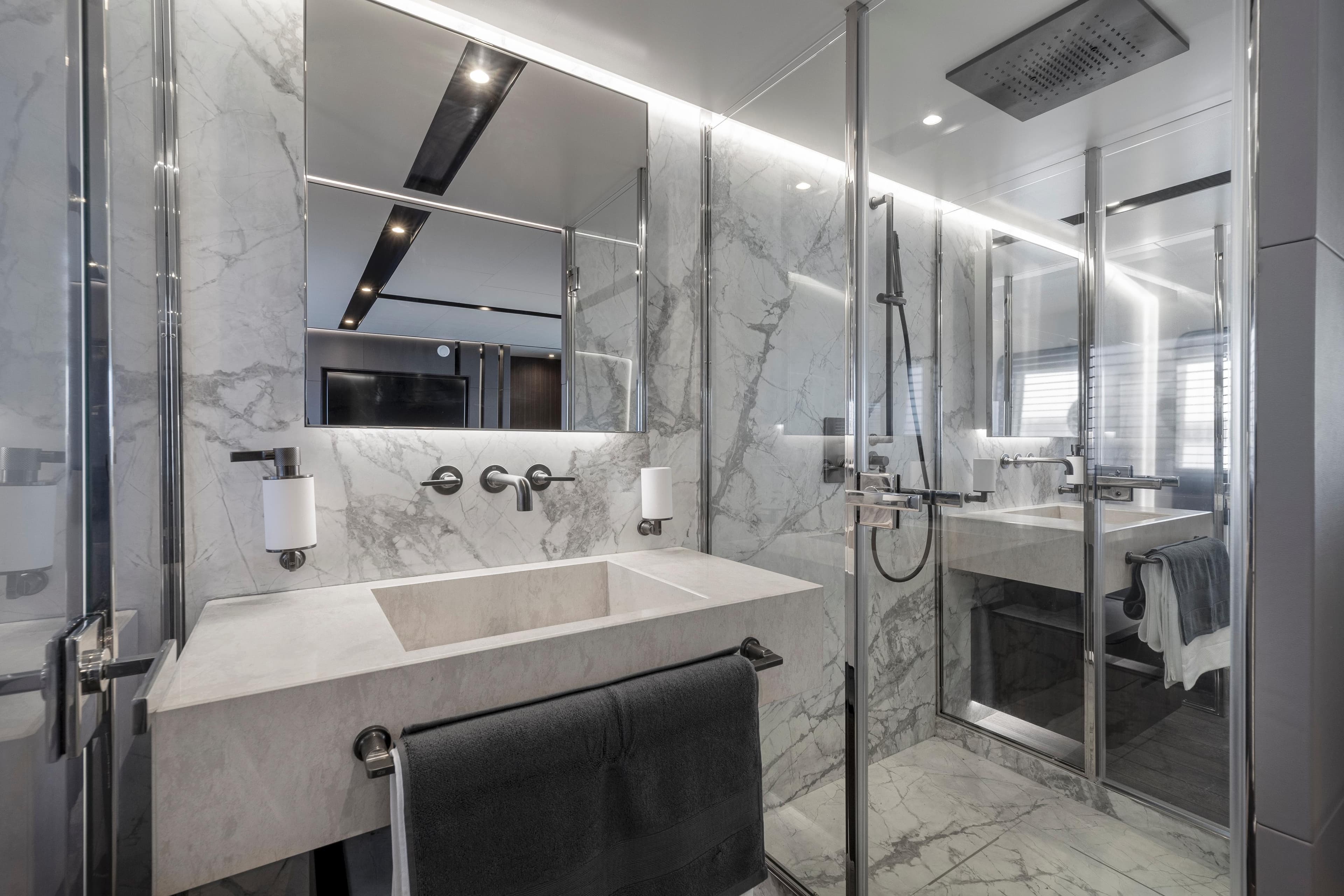 Luxurious bathroom in 2023 Astondoa AS8 Flybridge yacht with marble finishes.