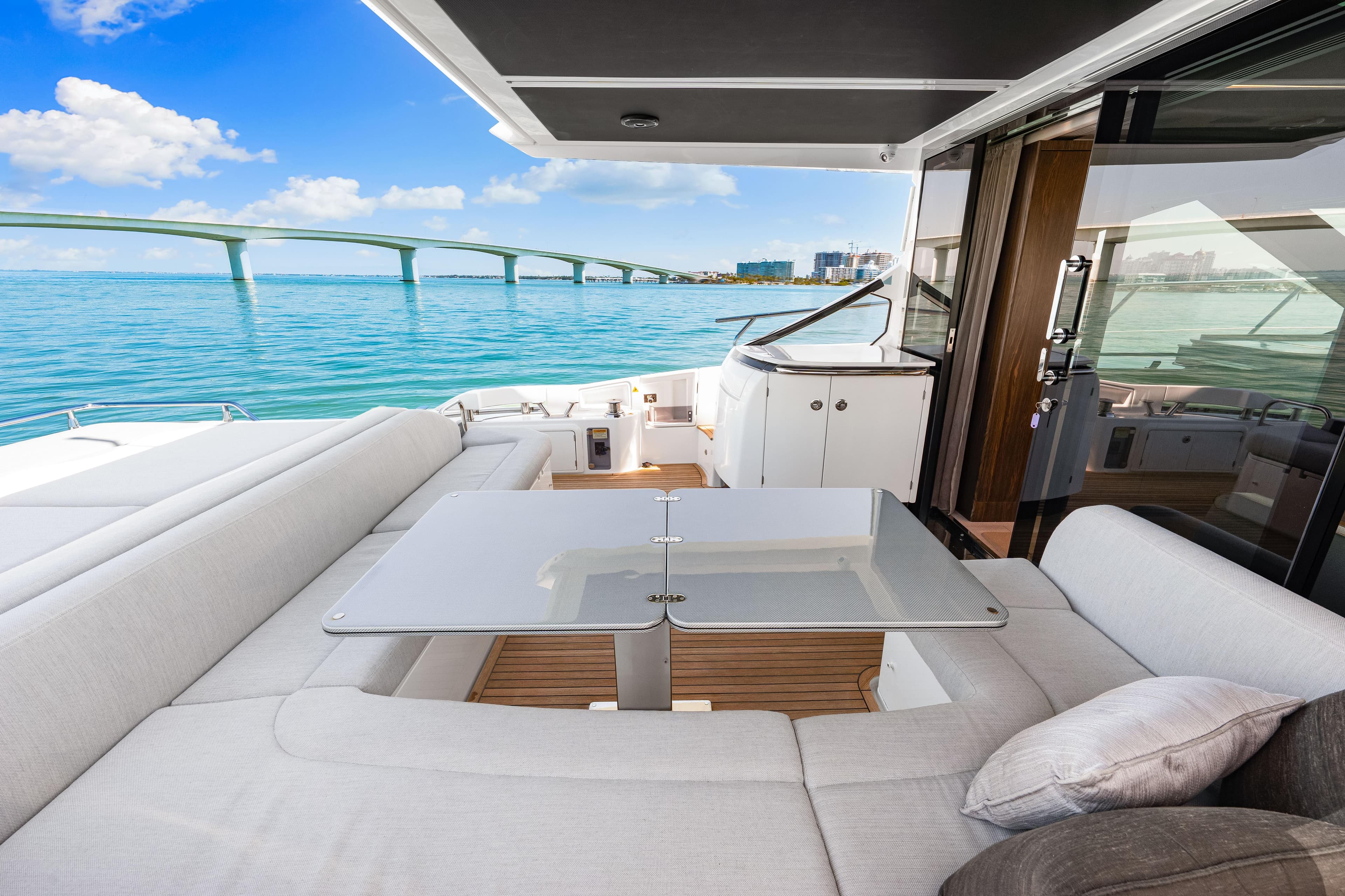 Luxurious 2020 Azimut S6 yacht interior with elegant seating and ocean view.