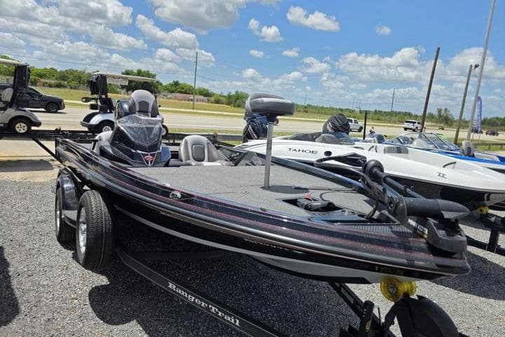 2024 Ranger Z518 Cup-Equipped boat on trailer under a sunny sky.