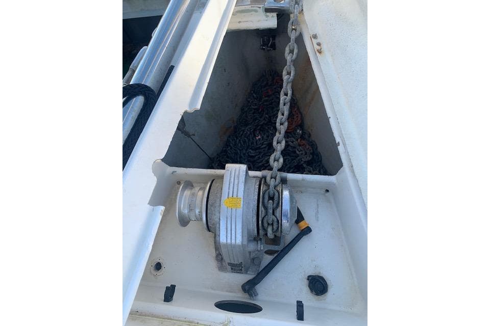 Anchor chain and windlass on 1993 Beneteau First 35.7 sailboat deck.