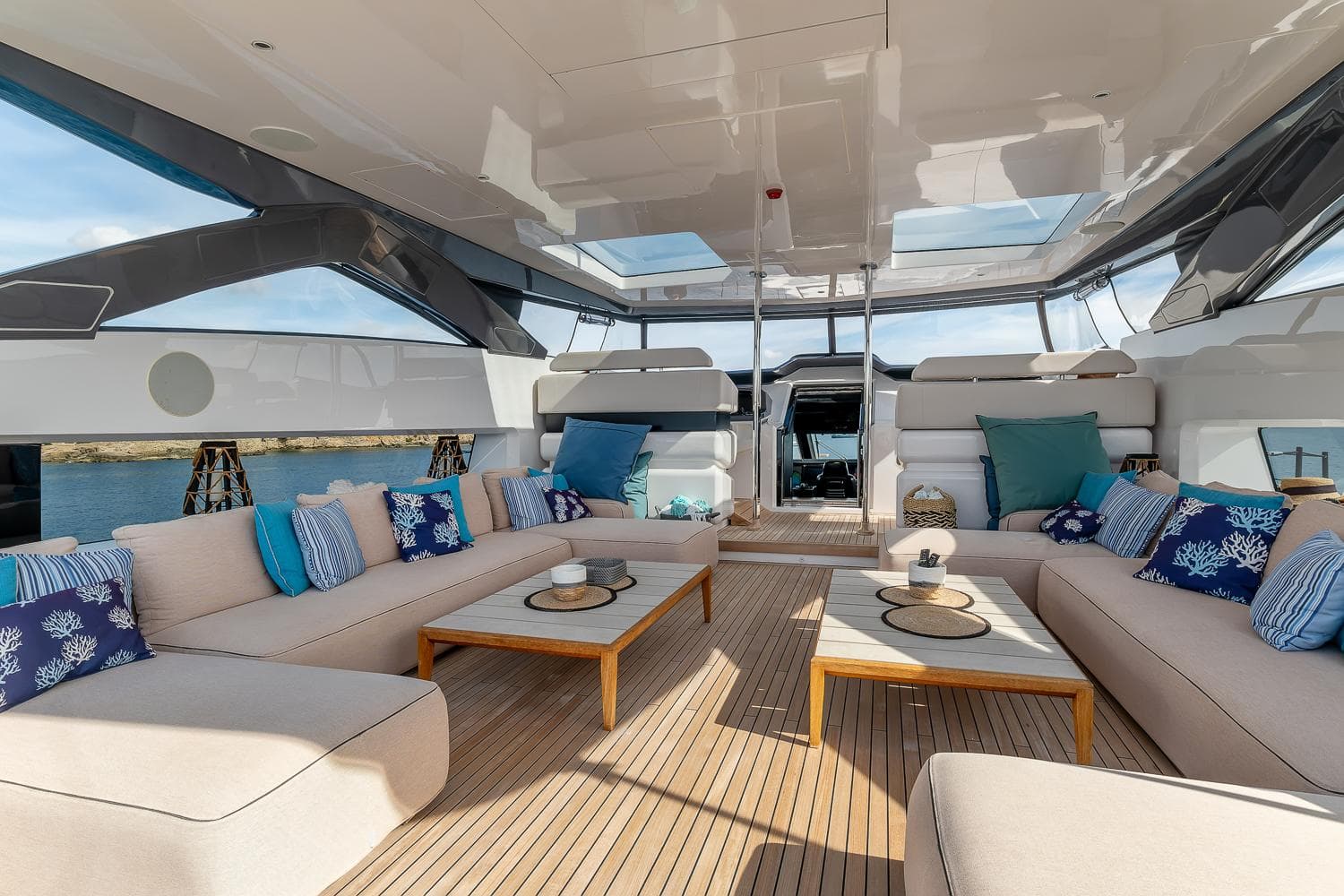 Luxurious interior of 2019 Custom Line 106 yacht with elegant seating and decor.