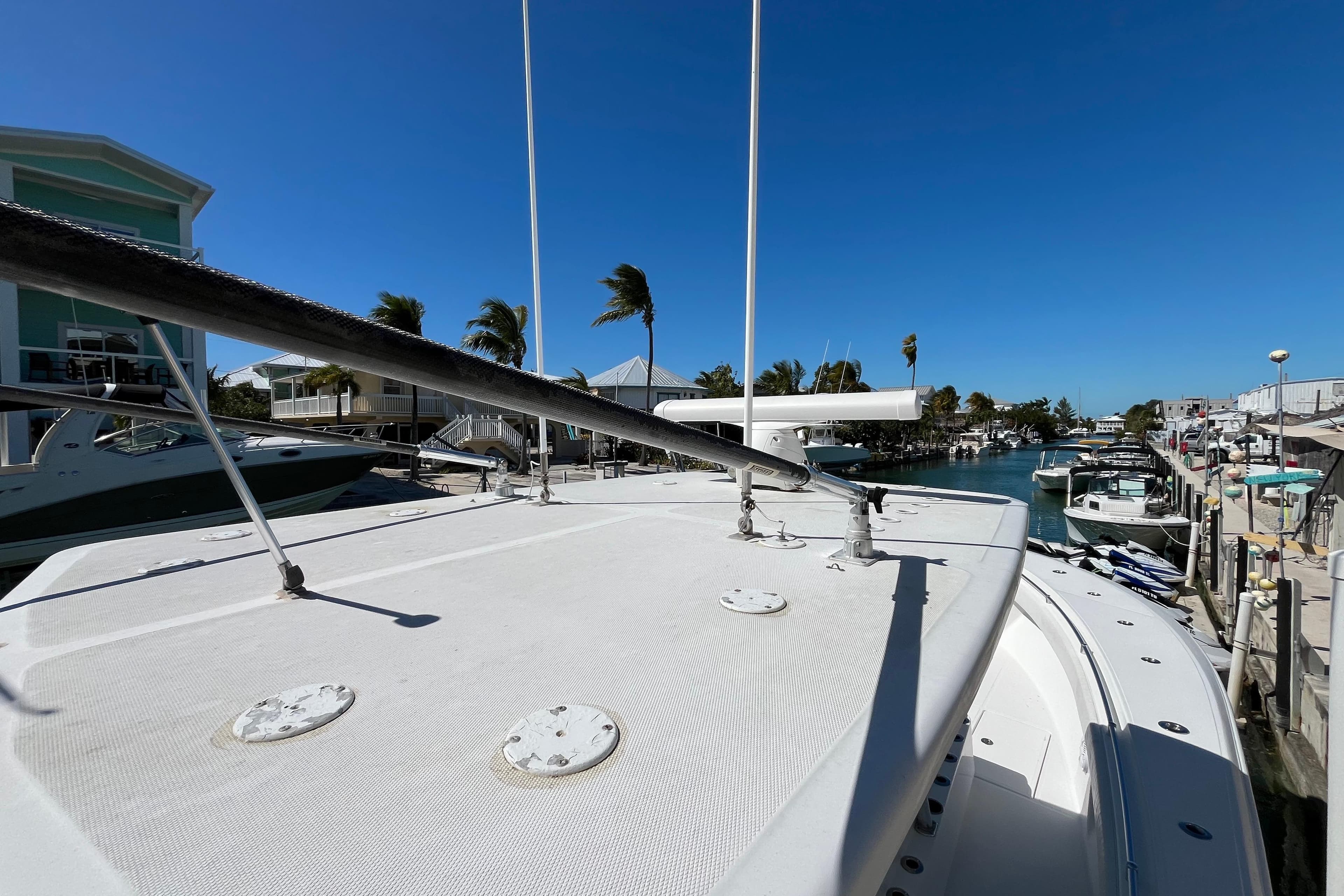2016 SeaHunter 35 Tournament boat docked in a sunny marina.