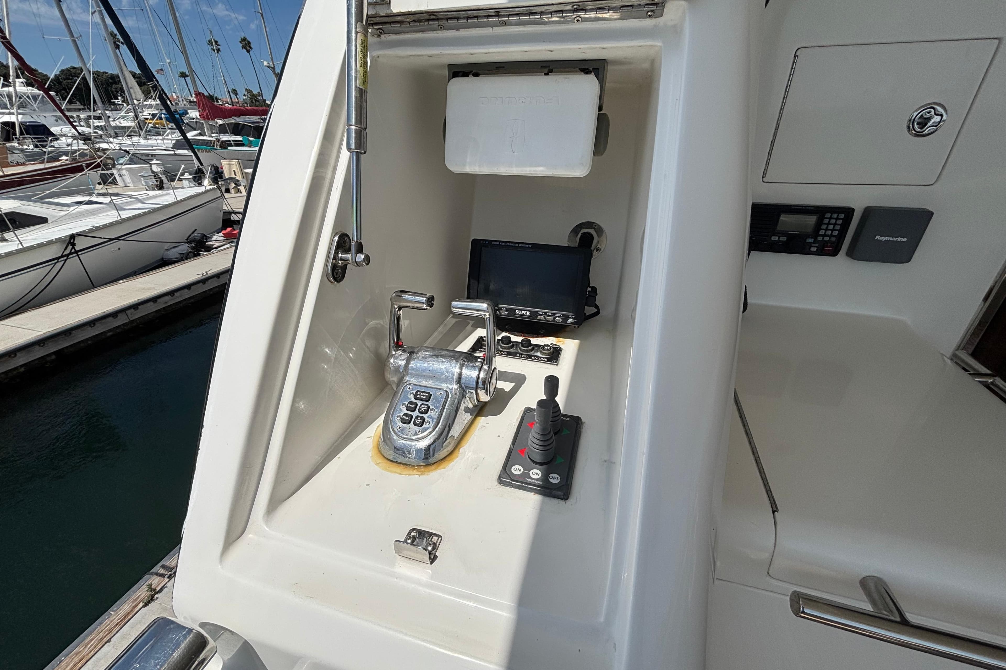 Control panel of a 2010 Norseman 80 yacht, featuring navigation and communication equipment.