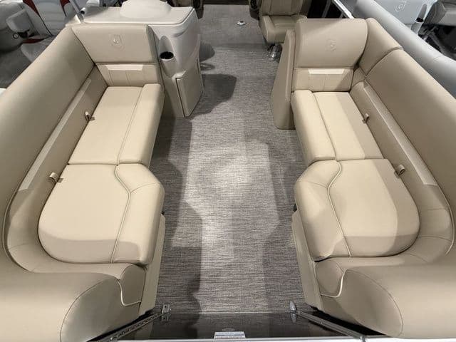 2026 Godfrey Pontoons Xperience 2286 SBX interior with beige seating and carpeted floor.