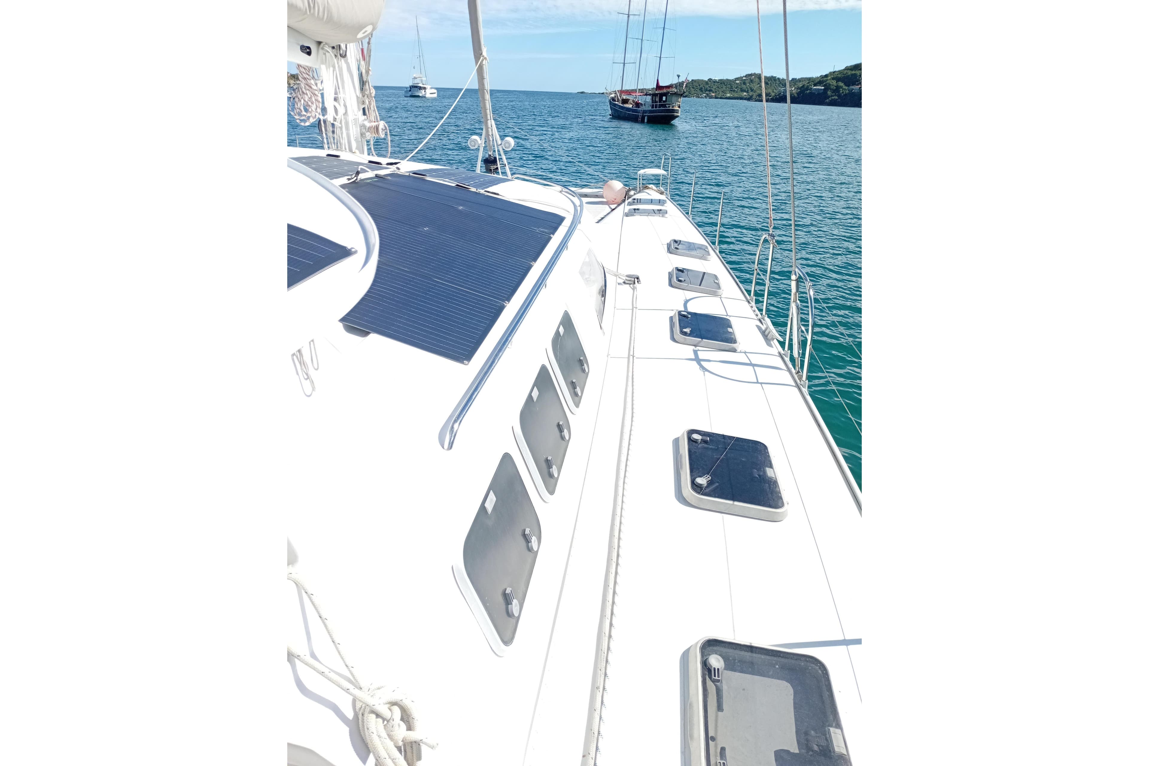 Sailing deck of 1995 Fountaine Pajot Marquises 56 catamaran on calm sea.