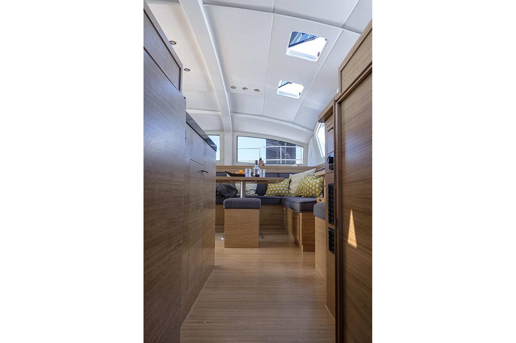 Interior of 2026 C-Catamarans C-CAT 48, featuring modern wood finish and skylights.
