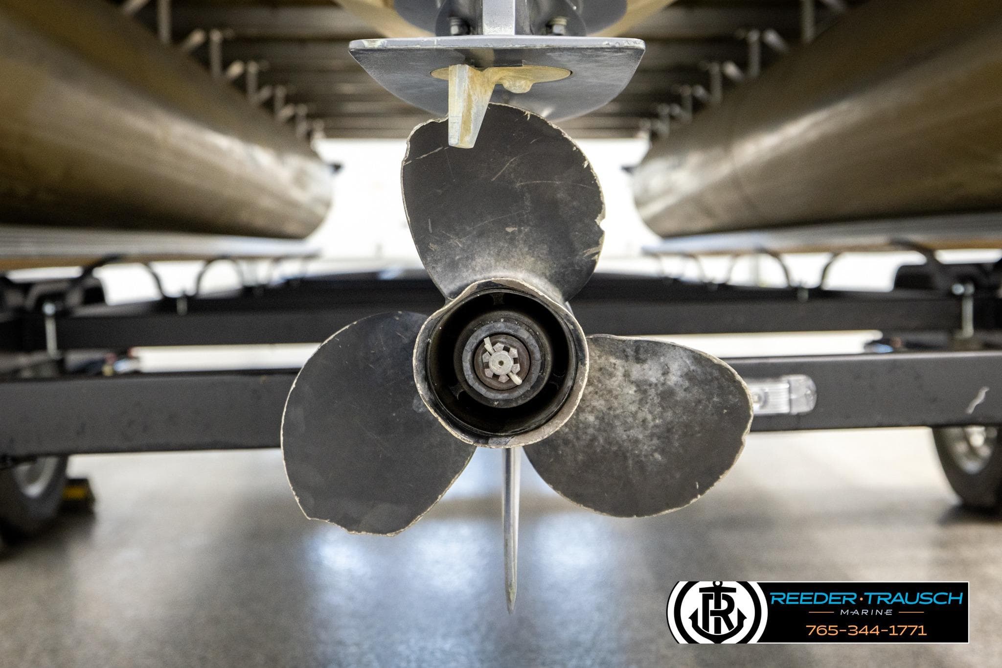 Close-up of a 2008 Sedona 20 CR boat propeller on a trailer.