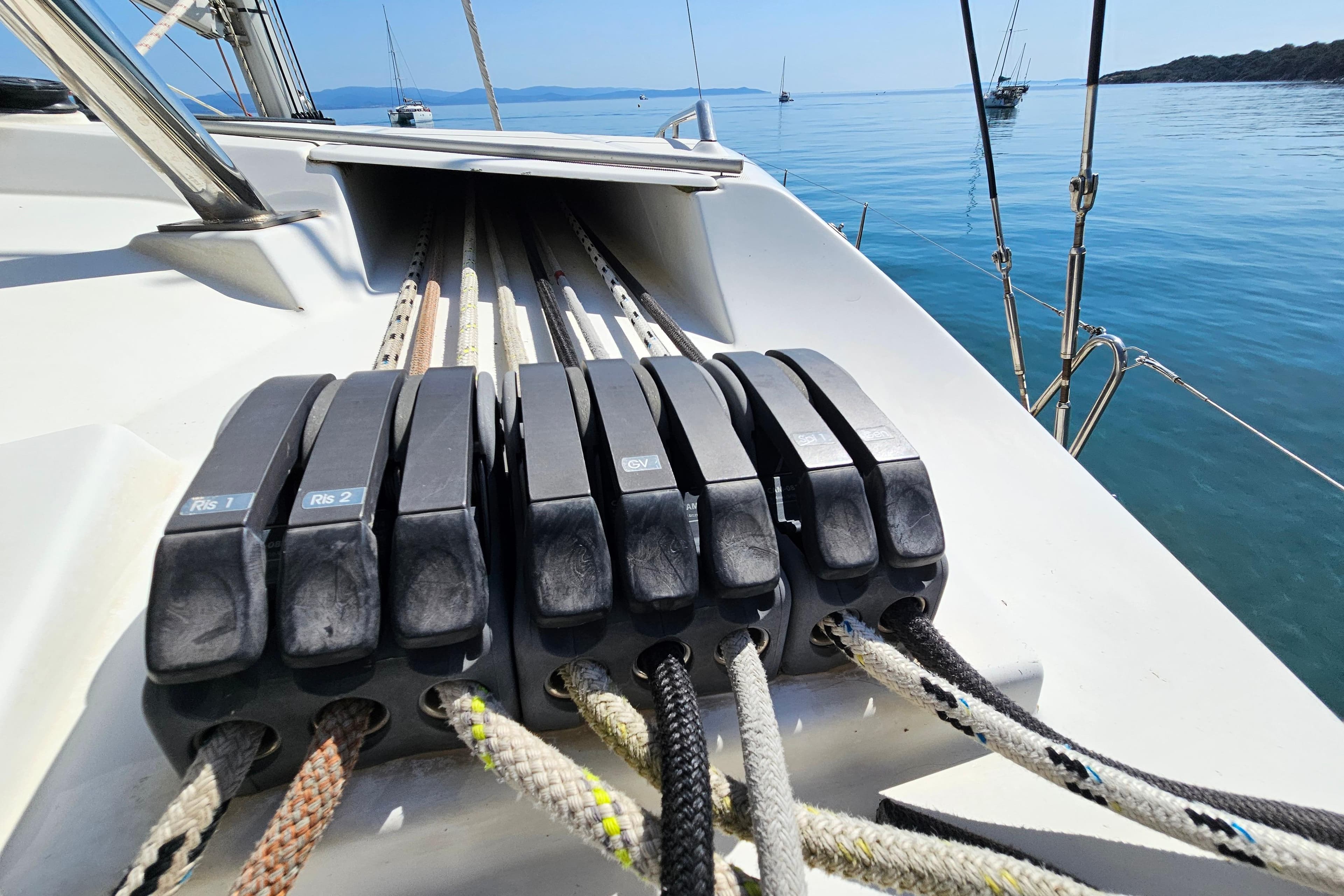 Sailing ropes and cleats on a 2008 Lagoon 420 catamaran deck.