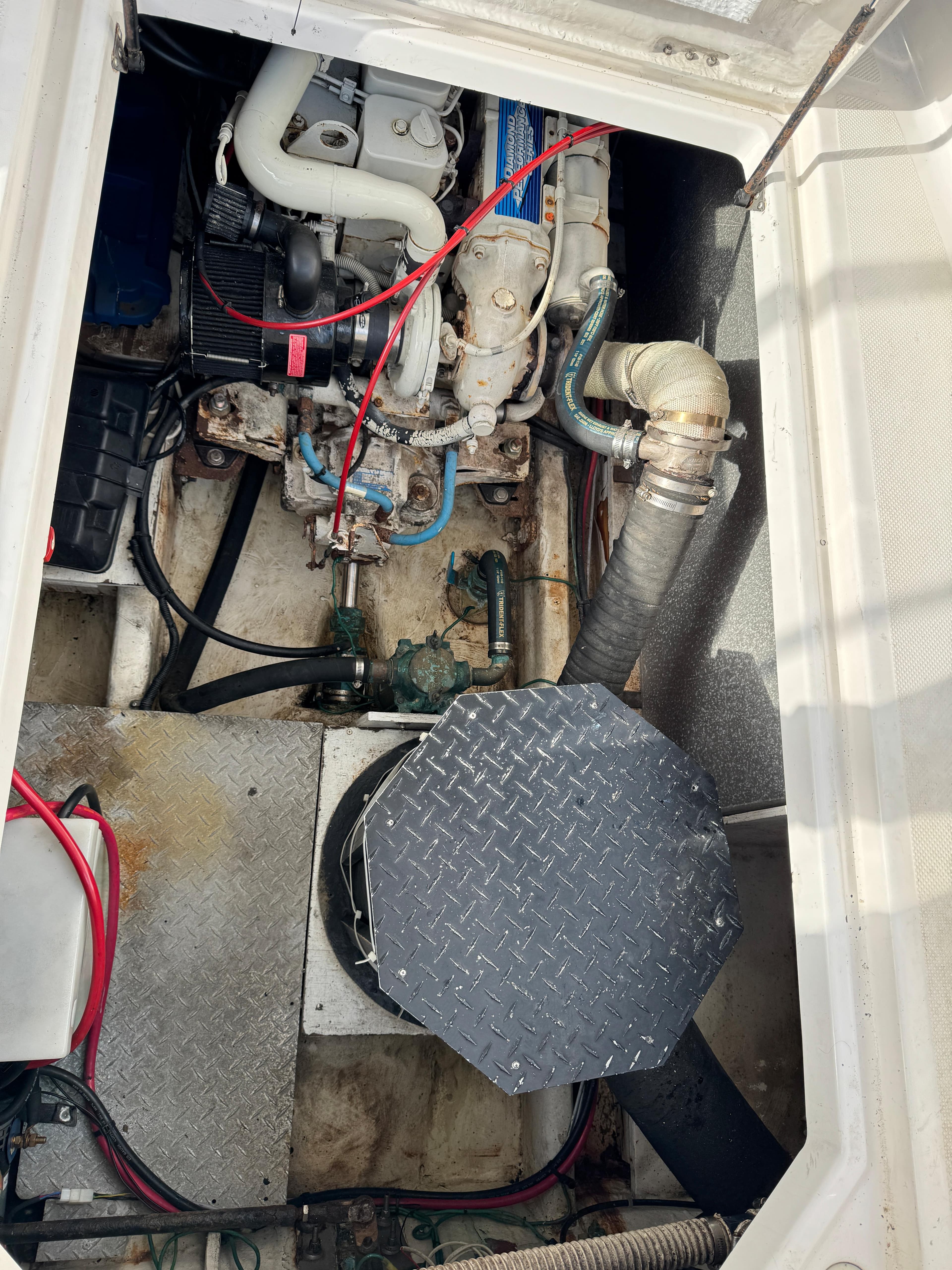 Engine compartment of a 1996 Bayliner 3388 Command Bridge Motoryacht.