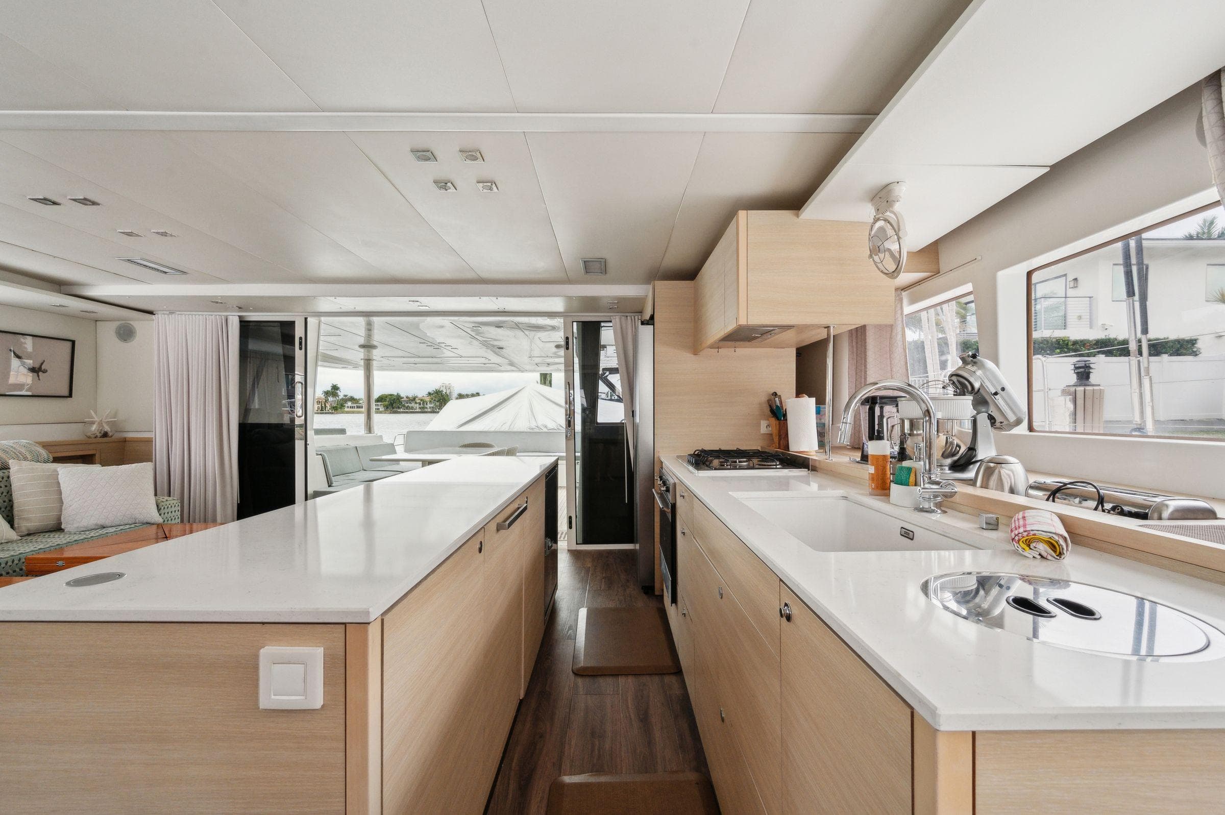 Interior of 2014 Lagoon 620 yacht, featuring modern kitchen and spacious design.