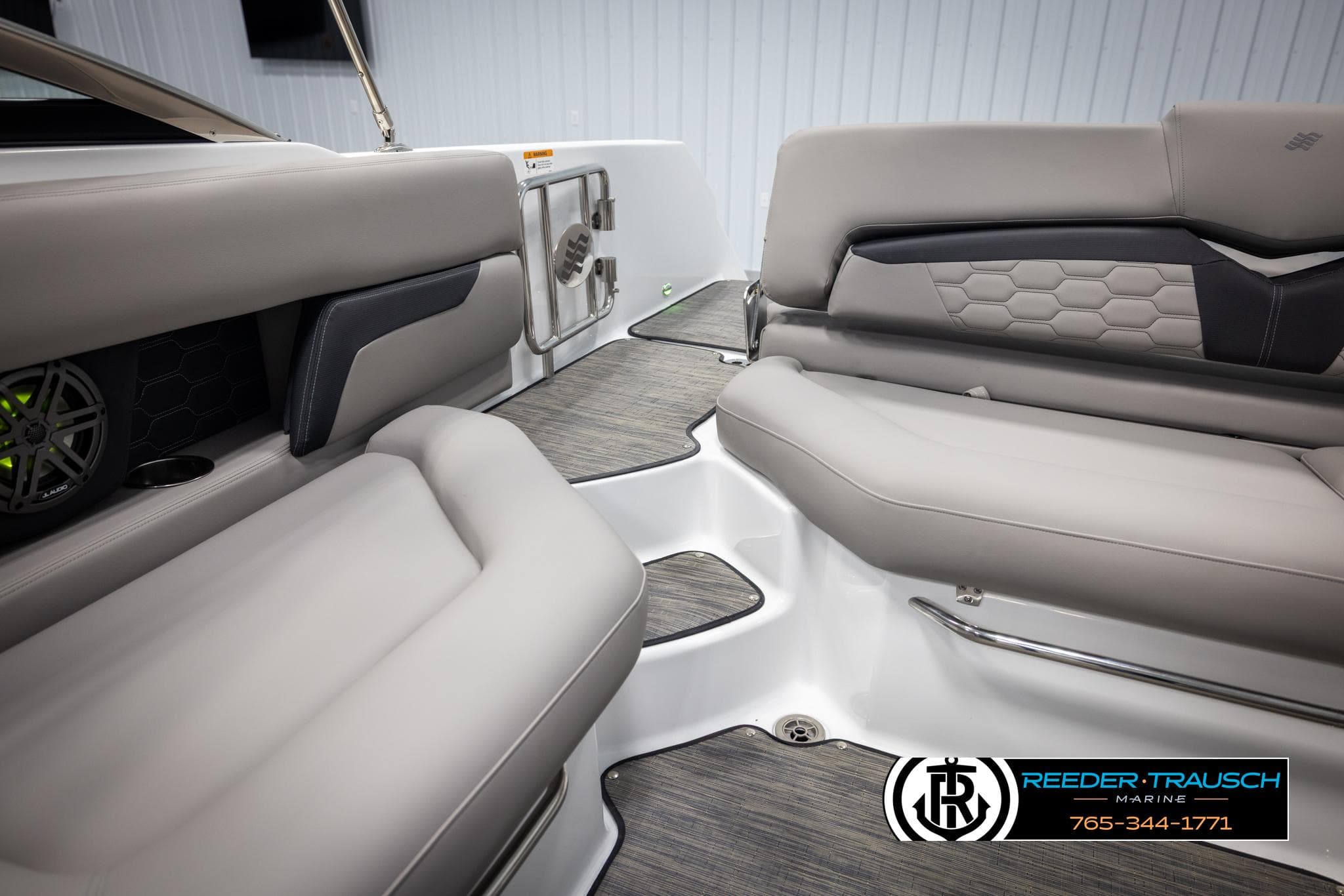 Interior of 2025 Four Winns HD5 boat with luxurious seating and modern design.