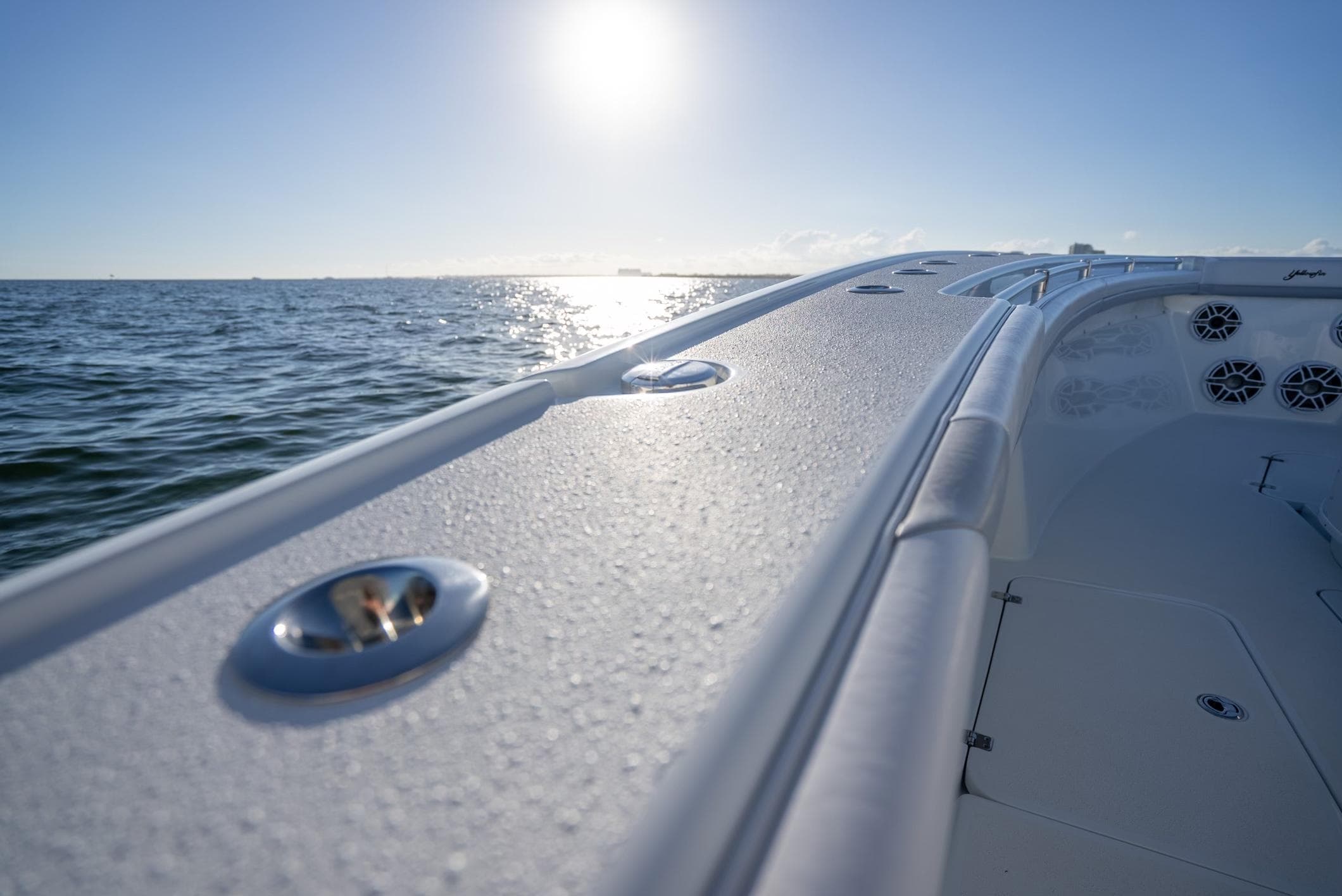 2019 Yellowfin 39 boat on calm ocean waters under a bright sun.