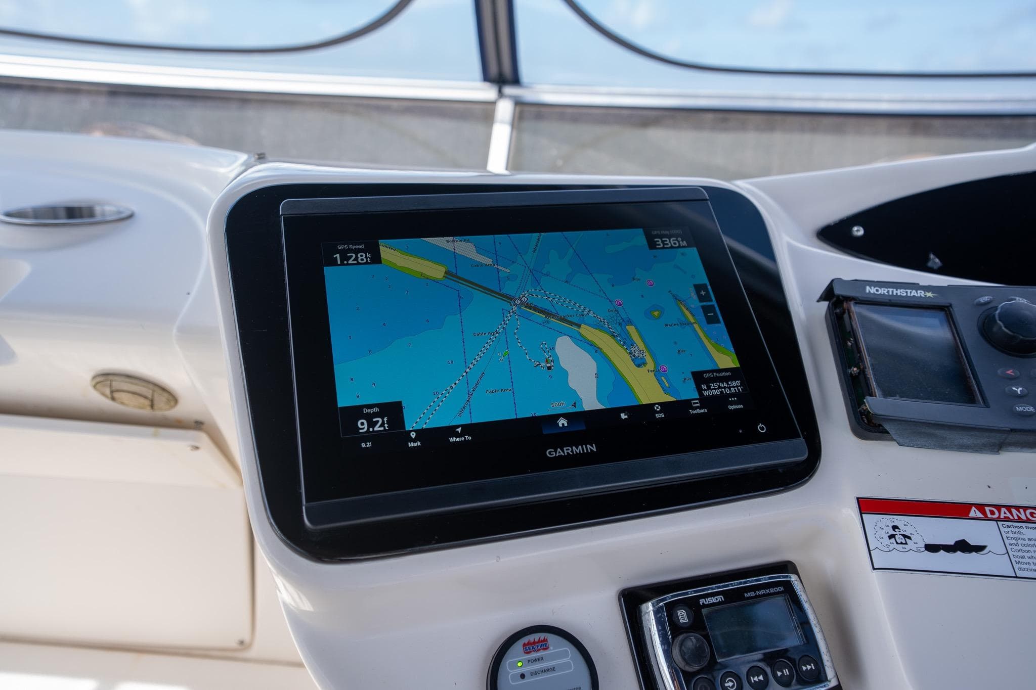Navigation system on 2009 Meridian 391 Sedan yacht dashboard.